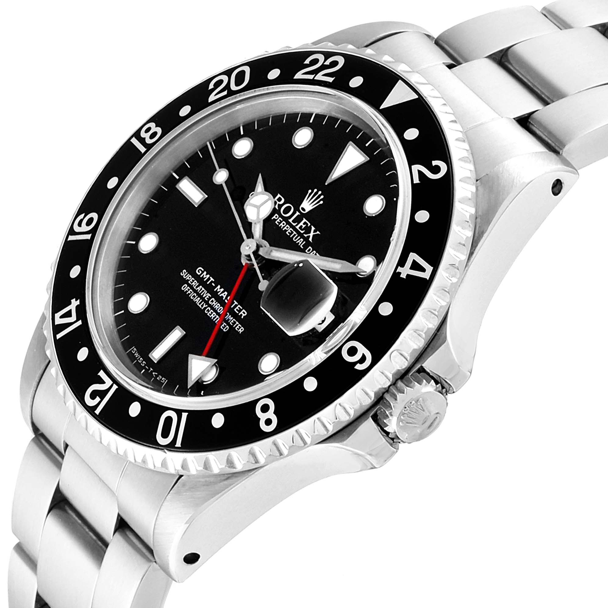 The image shows a close-up of a Rolex GMT-Master 16700 Men's Stainless Steel Black Dial 16700 Men's Stainless Steel Black Dial watch, highlighting the black dial, bezel, and part of the bracelet and crown.