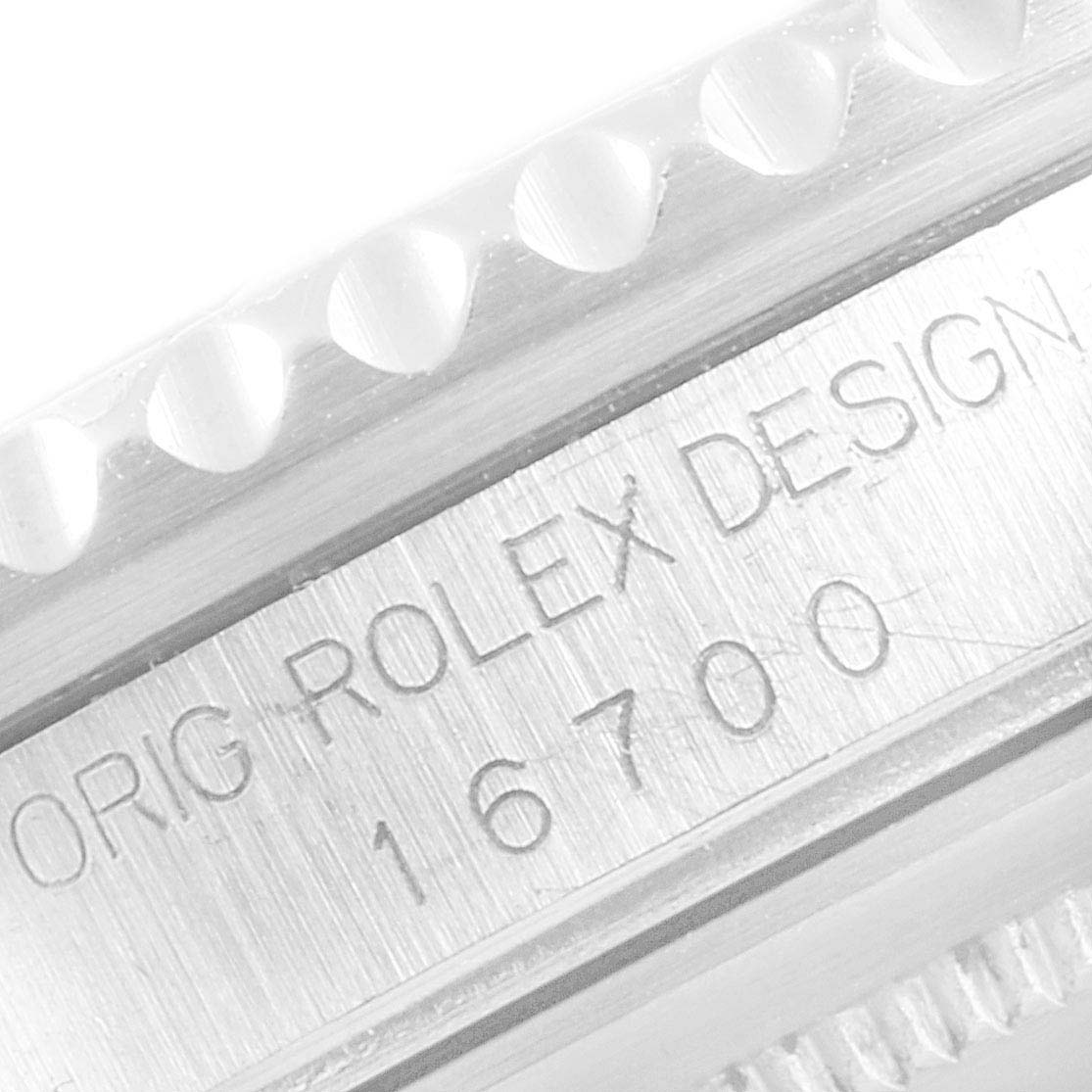 This image shows a close-up of the side engraving on a Rolex GMT-Master 16700 Men's Stainless Steel Black Dial 16700 Men's Stainless Steel Black Dial model, featuring the serial number.