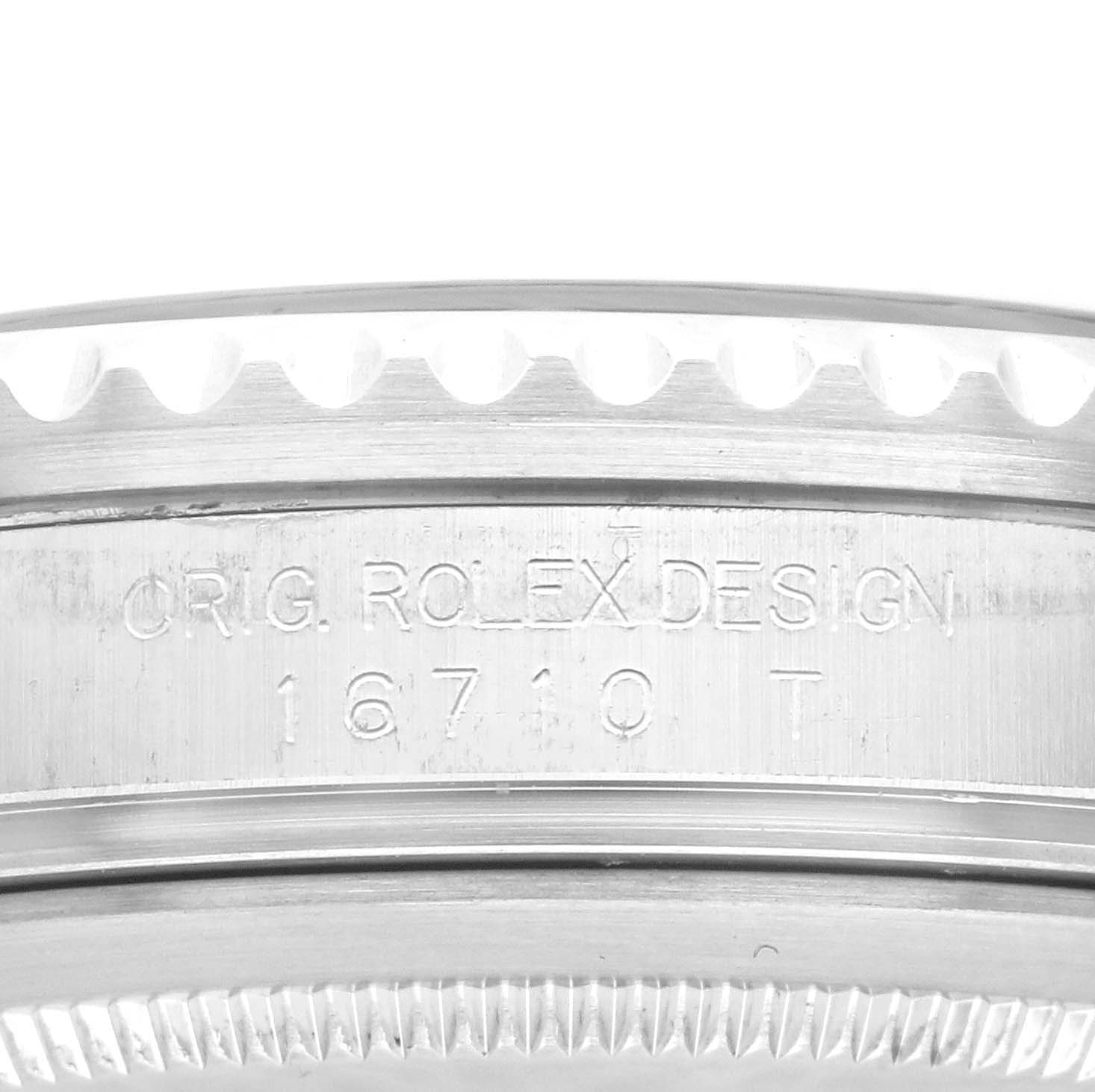 The image shows a close-up of the case side of a Rolex GMT-Master 16710 Men
s Stainless Steel Black Dial 16710 Men
s Stainless Steel Black Dial, highlighting the engraved design and model number.