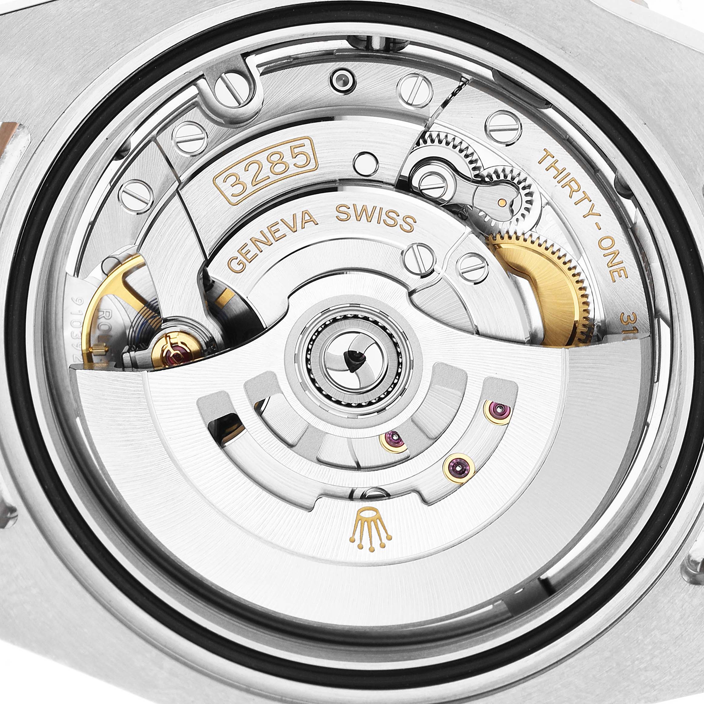 The image shows the movement mechanism of the Rolex GMT-Master 126711CHNR Men's Steel and Gold (two tone) Black Dial, showcasing its intricate gears and rotor from the back angle.