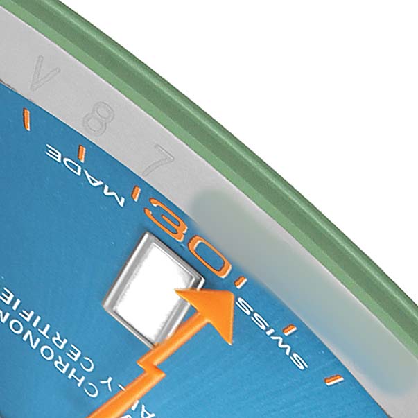 The image shows a close-up of the Rolex Milgauss 116400 Men's Stainless Steel Blue Dial dial, focusing on the orange seconds hand and minute markers.