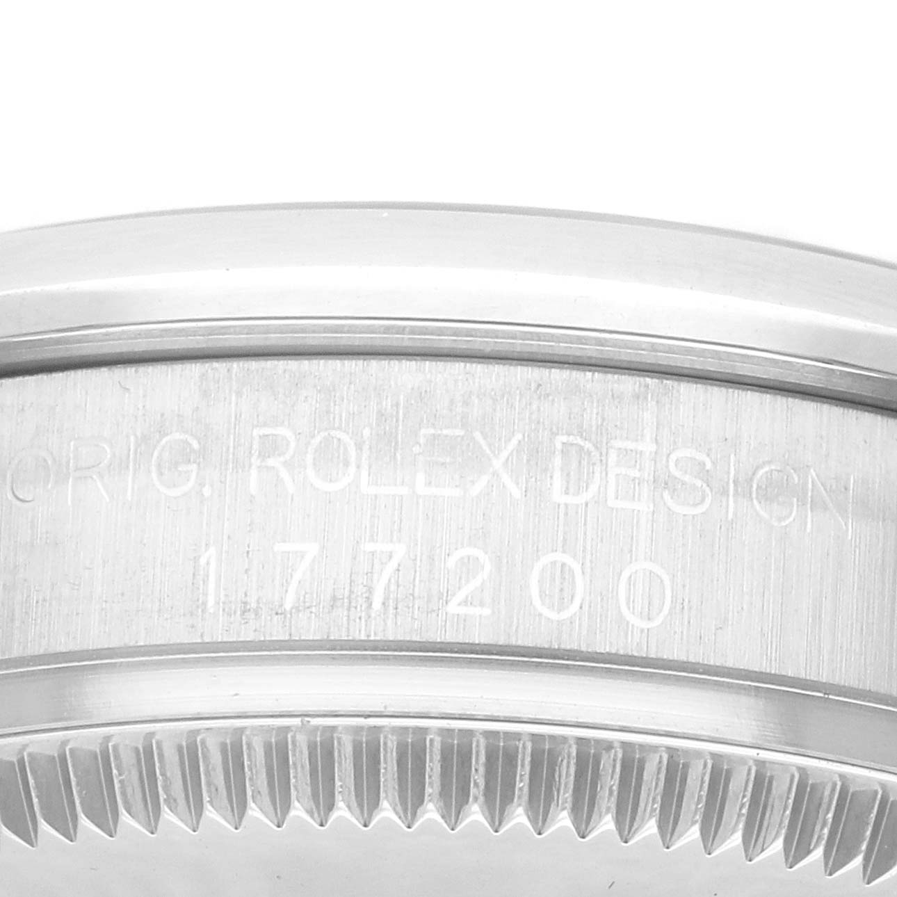 Close-up view of the side of a mid-size Rolex watch, showing the bezel and the engraved model number 177200.