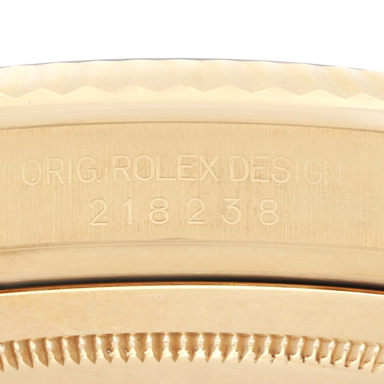 The image shows a close-up of the side engraving on the President model by Rolex, highlighting the design number.