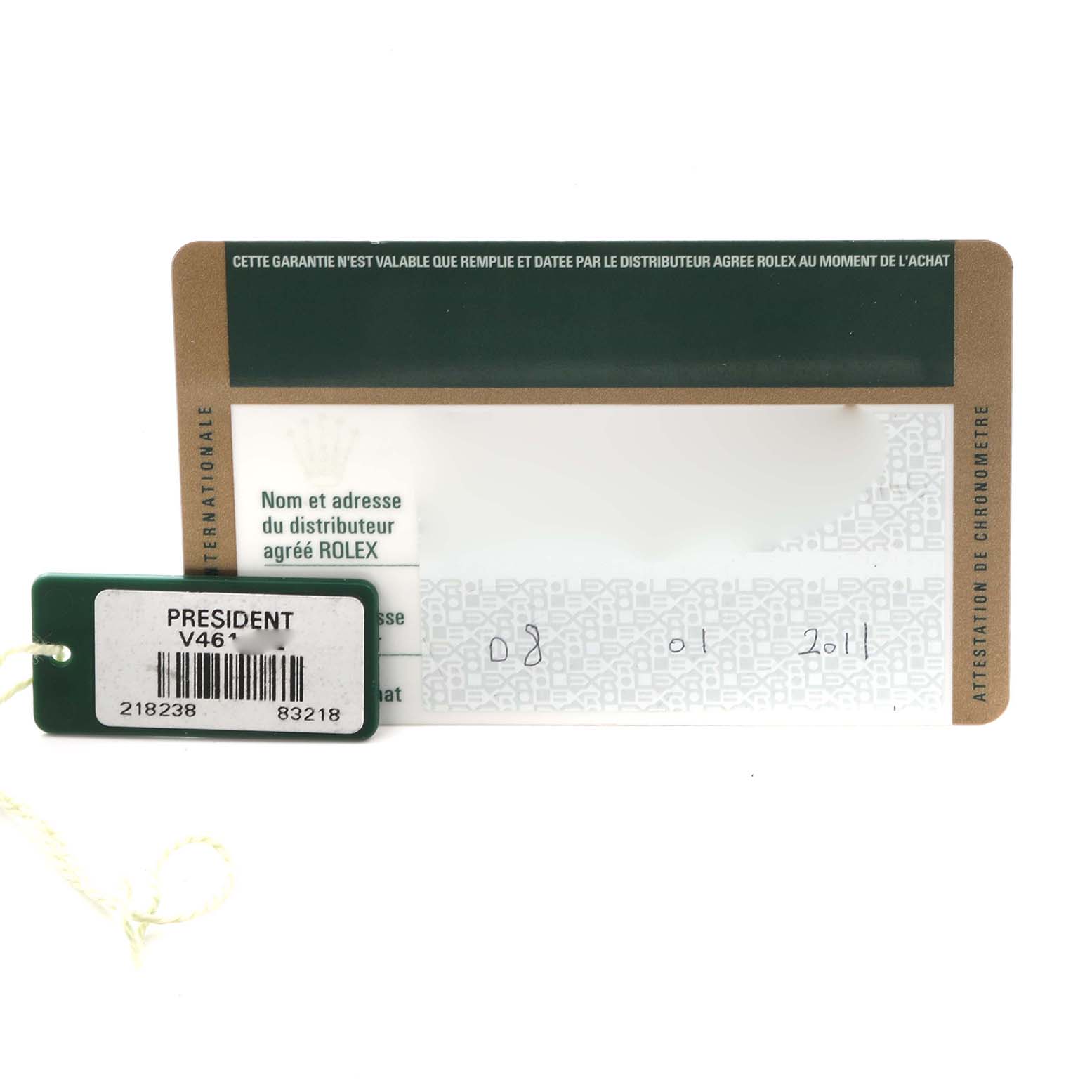 The image shows the warranty card and tag for a Rolex President 218238 Men's Yellow Gold Champagne Dial 218238 Men's Yellow Gold Champagne Dial model, displaying details like serial and model numbers.