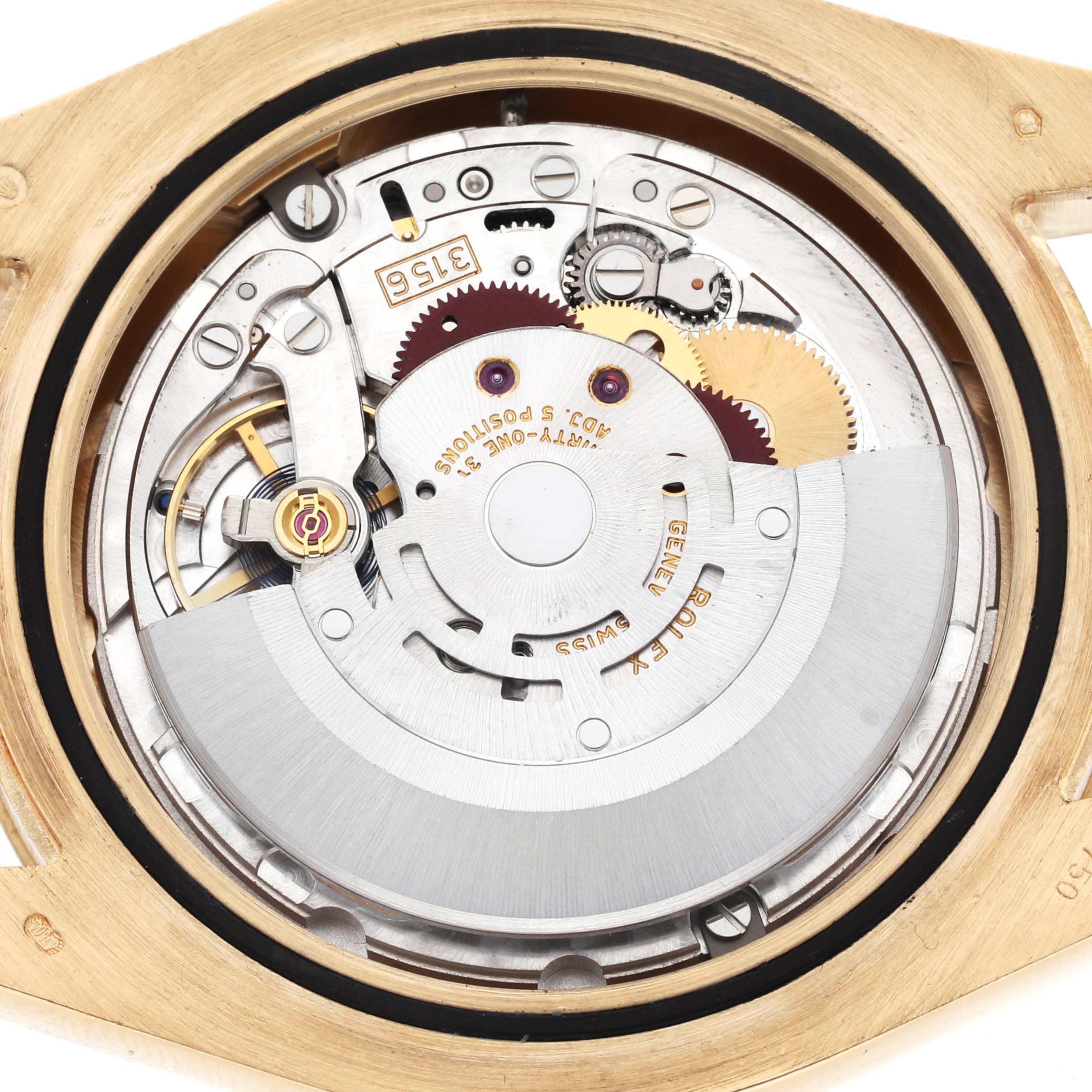 This image shows the internal mechanism of a Rolex President 218238 Men's Yellow Gold Champagne Dial 218238 Men's Yellow Gold Champagne Dial watch from a top-down angle, highlighting the movement components.