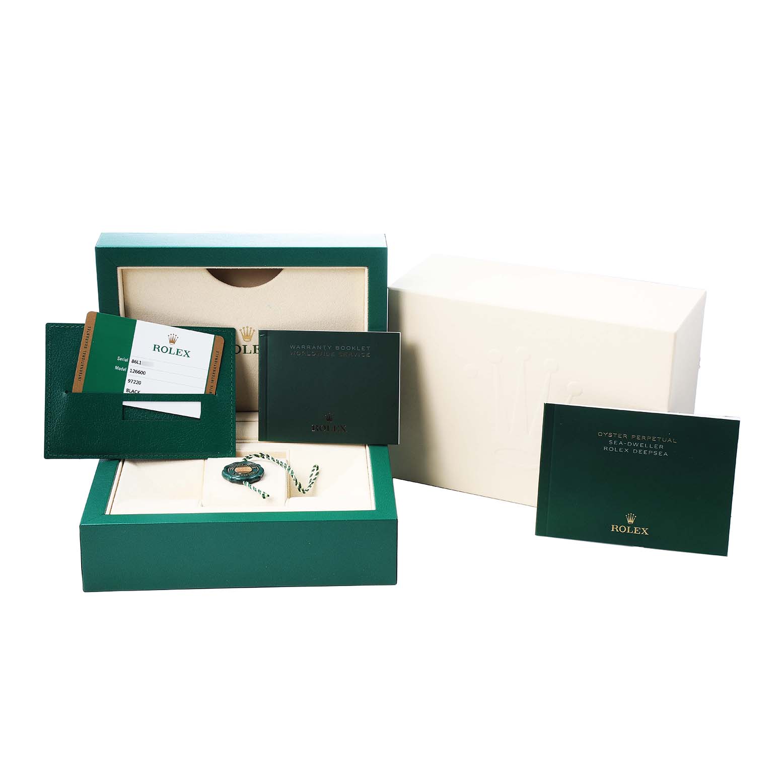The image shows a Rolex Sea-Dweller 126600 Men's Stainless Steel Black Dial box with a wallet, warranty booklet, tags, and outer packaging from a front angle.