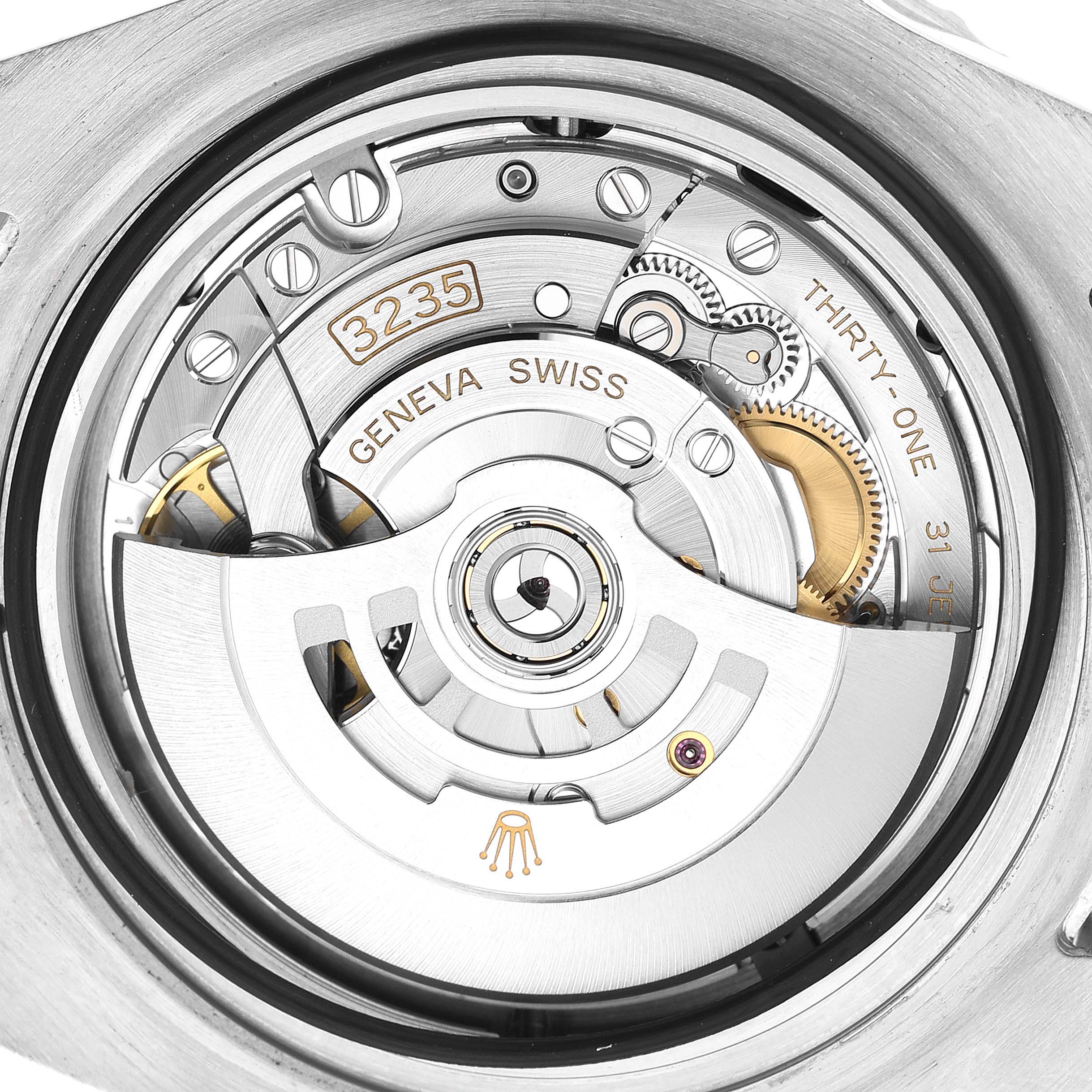 The image shows a detailed view of the Rolex Sea-Dweller 126600 Men's Stainless Steel Black Dial's movement mechanism from the back.