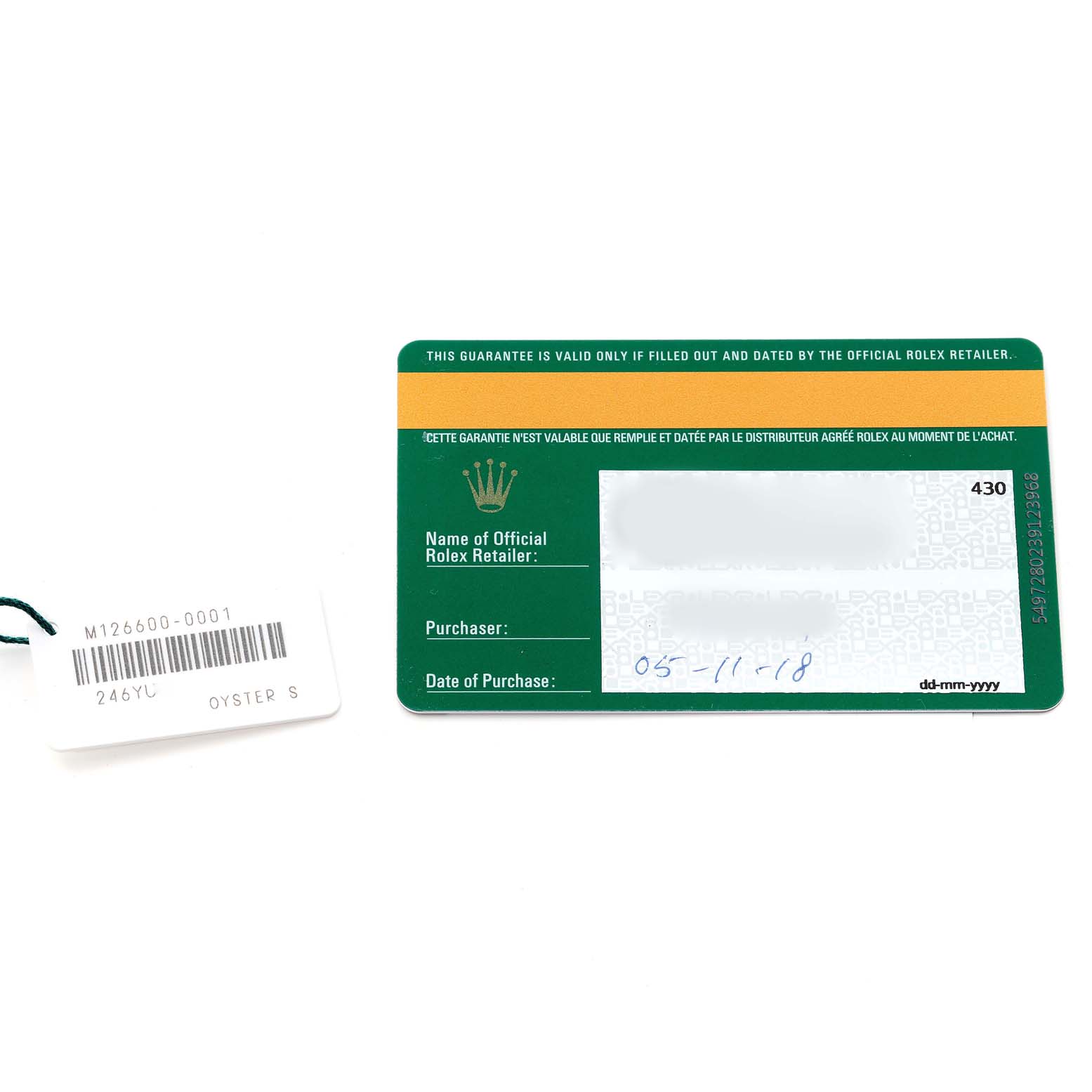 The image shows a warranty card and a tag for the Rolex Sea-Dweller 126600 Men's Stainless Steel Black Dial 126600 Men's Stainless Steel Black Dial model.