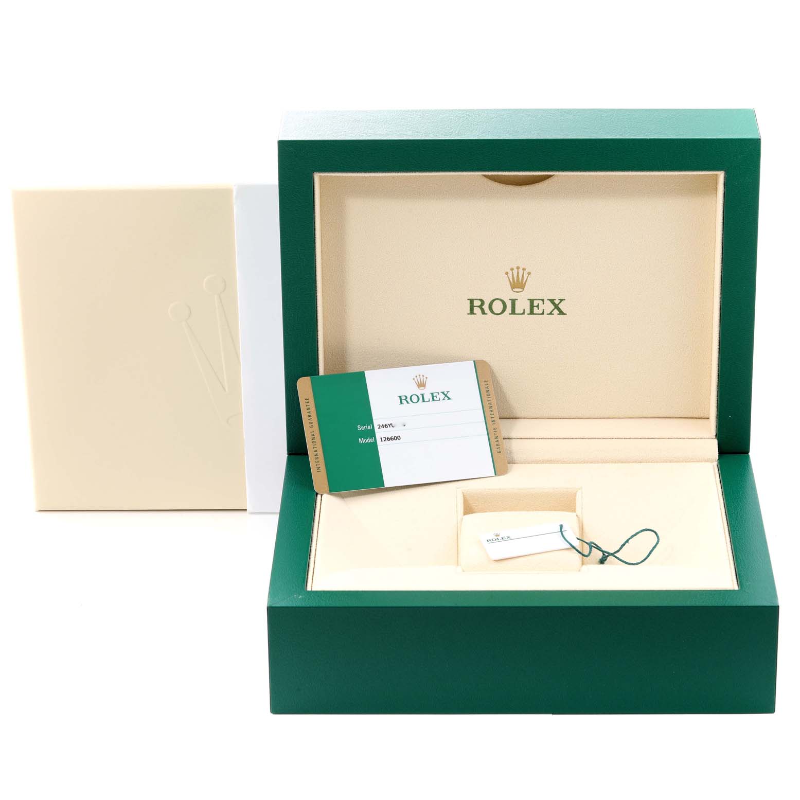 The image shows the open box and accessories of a Rolex Sea-Dweller 126600 Men's Stainless Steel Black Dial 126600 Men's Stainless Steel Black Dial, including a card and tag.