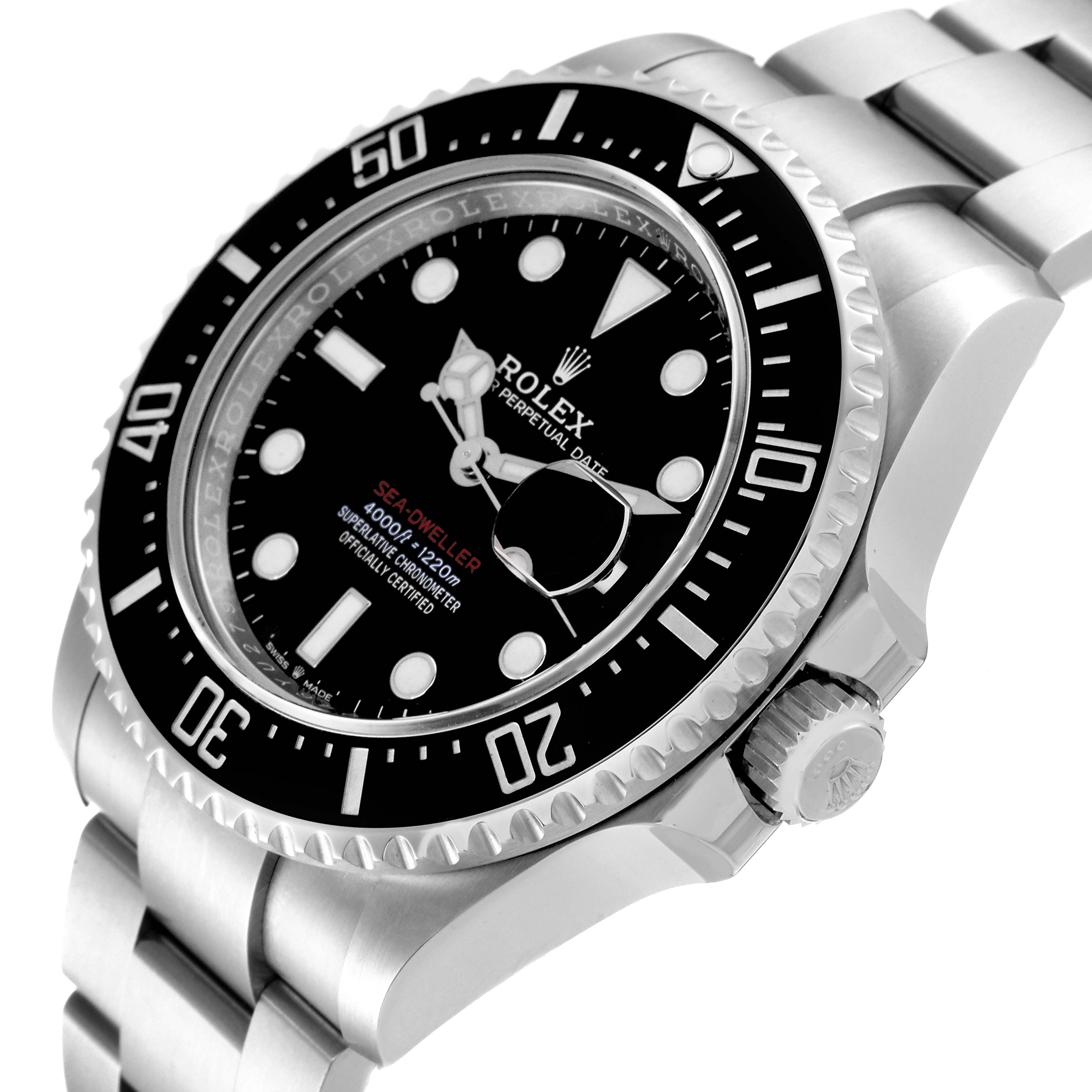This image shows a close-up of a Rolex Sea-Dweller 126600 Men's Stainless Steel Black Dial 126600 Men's Stainless Steel Black Dial watch at an angle, highlighting the bezel, dial, crown, and part of the stainless steel bracelet.
