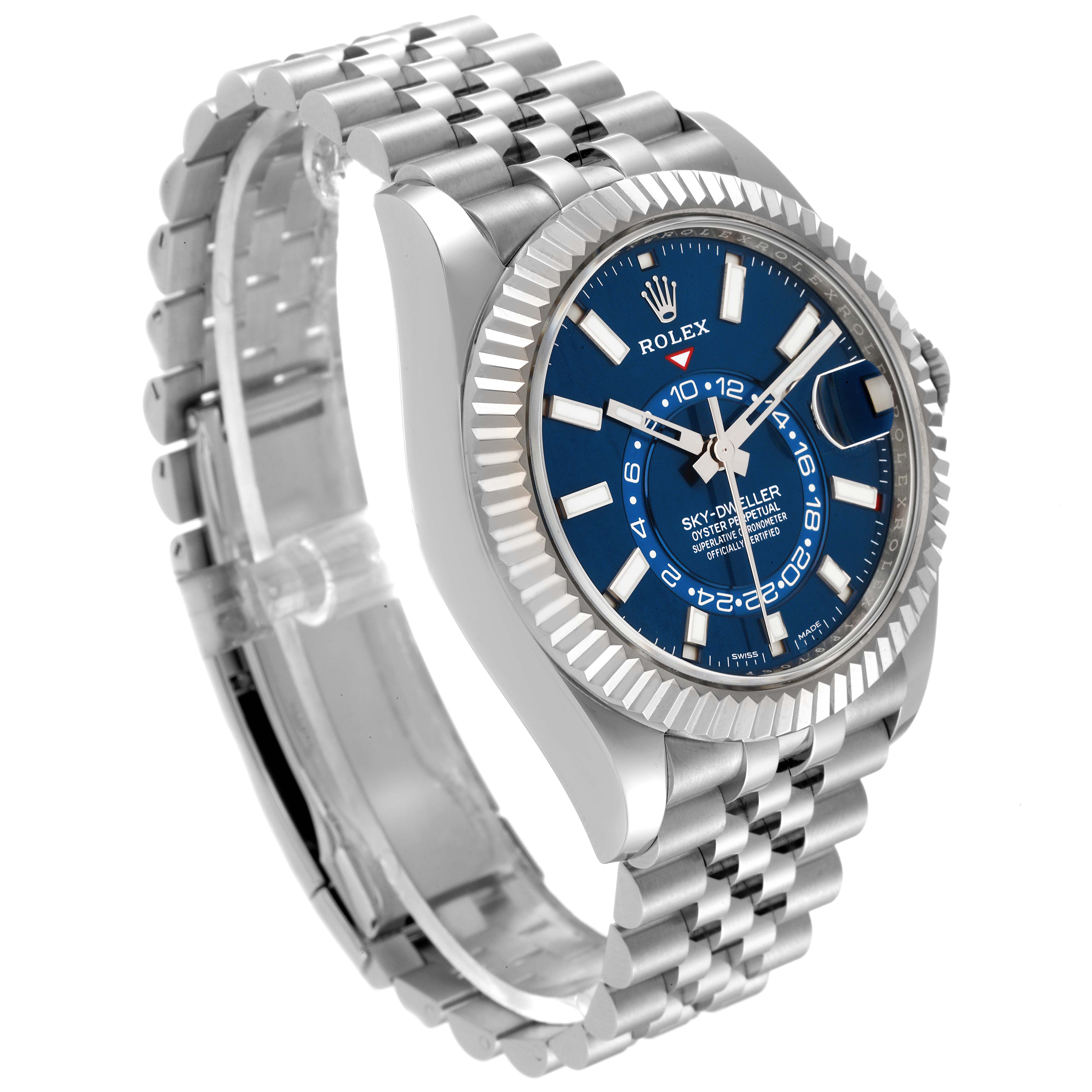 This image shows a Rolex Sky-Dweller 326934 Men's Stainless Steel Blue Dial 326934 Men's Stainless Steel Blue Dial watch from a three-quarter angle, highlighting its blue dial, fluted bezel, and jubilee bracelet.
