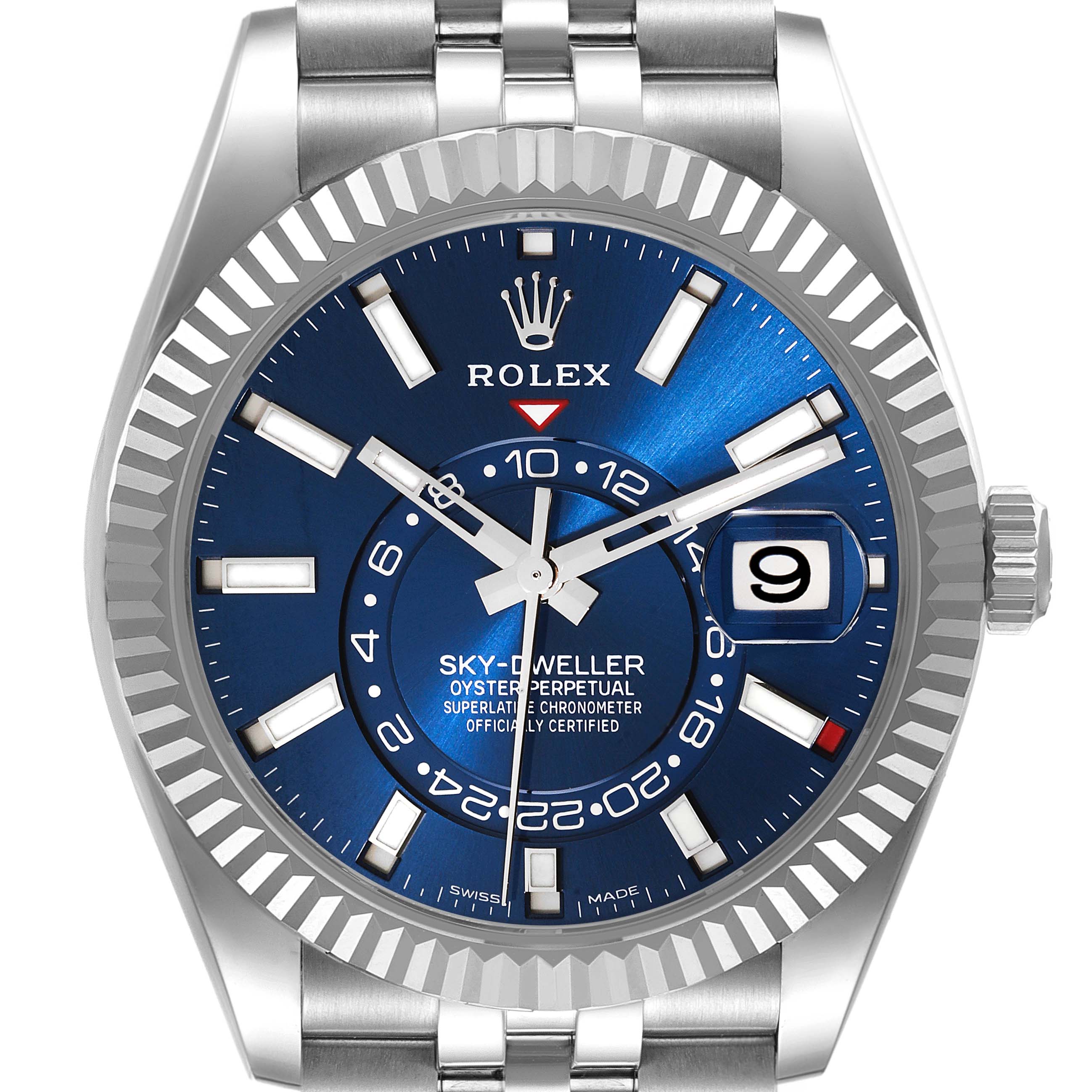 The image shows a front view of a Rolex Sky-Dweller 326934 Men's Stainless Steel Blue Dial 326934 Men's Stainless Steel Blue Dial watch, featuring a blue dial, fluted bezel, and date display at 3 o'clock.