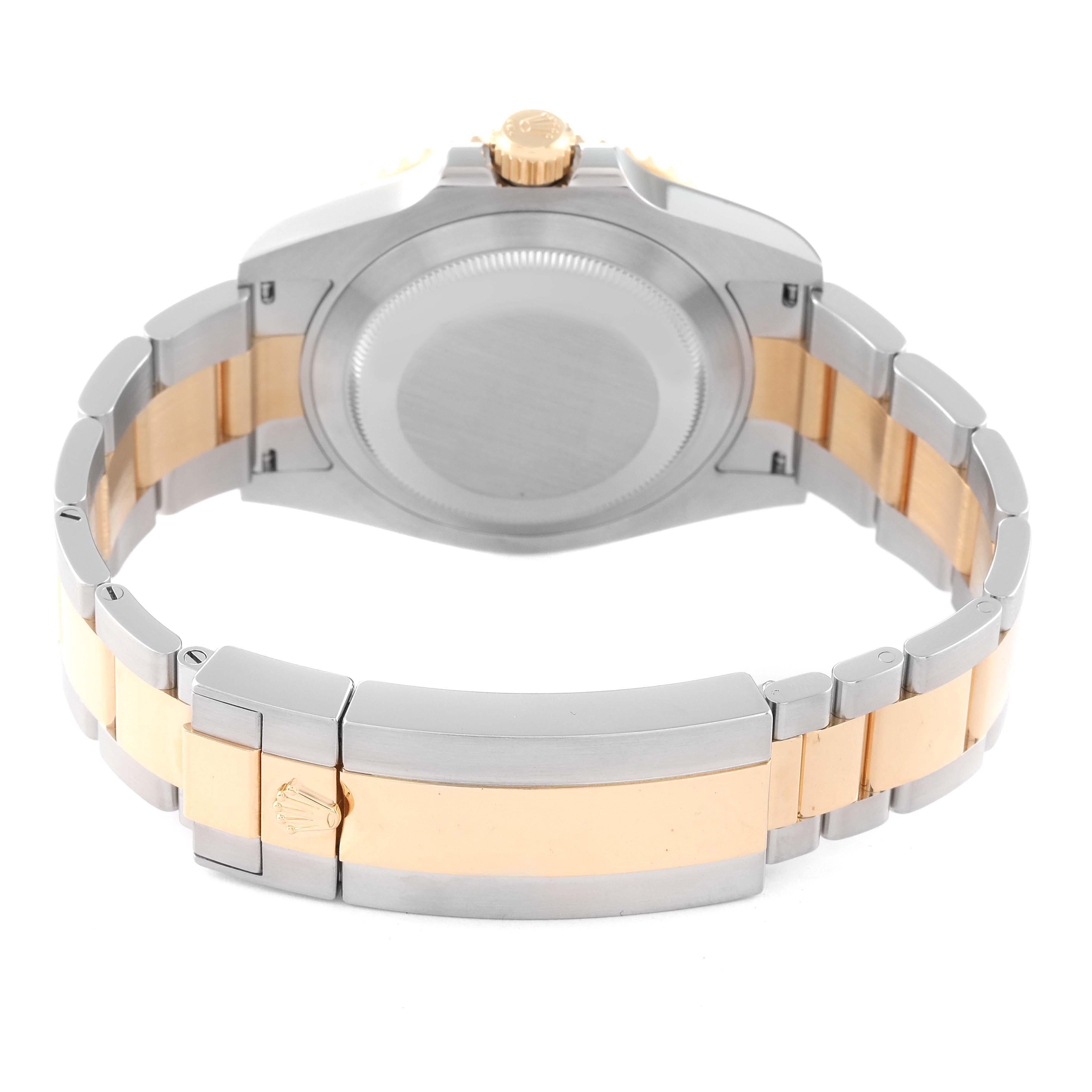 The image shows the back and bracelet of a Rolex Sea-Dweller 126613 Men
s Steel and Gold (two tone) Black Dial 126613 Men
s Steel and Gold (two tone) Black Dial watch, highlighting the stainless steel and gold elements.