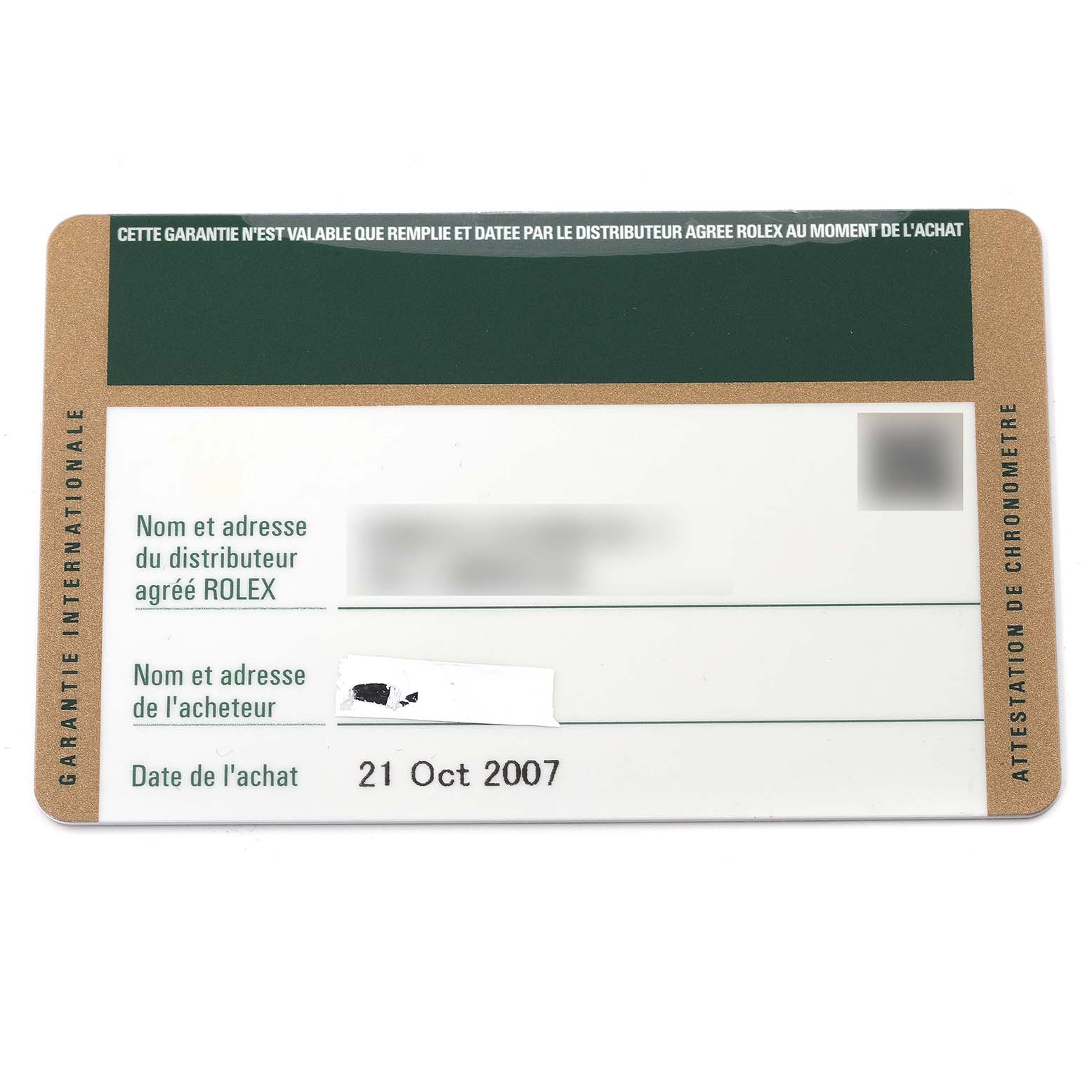 The image shows a Warranty card for a Rolex Submariner 16610 Men
s Stainless Steel Black Dial 16610 Men
s Stainless Steel Black Dial watch, dated 21 Oct 2007, with some details obscured.