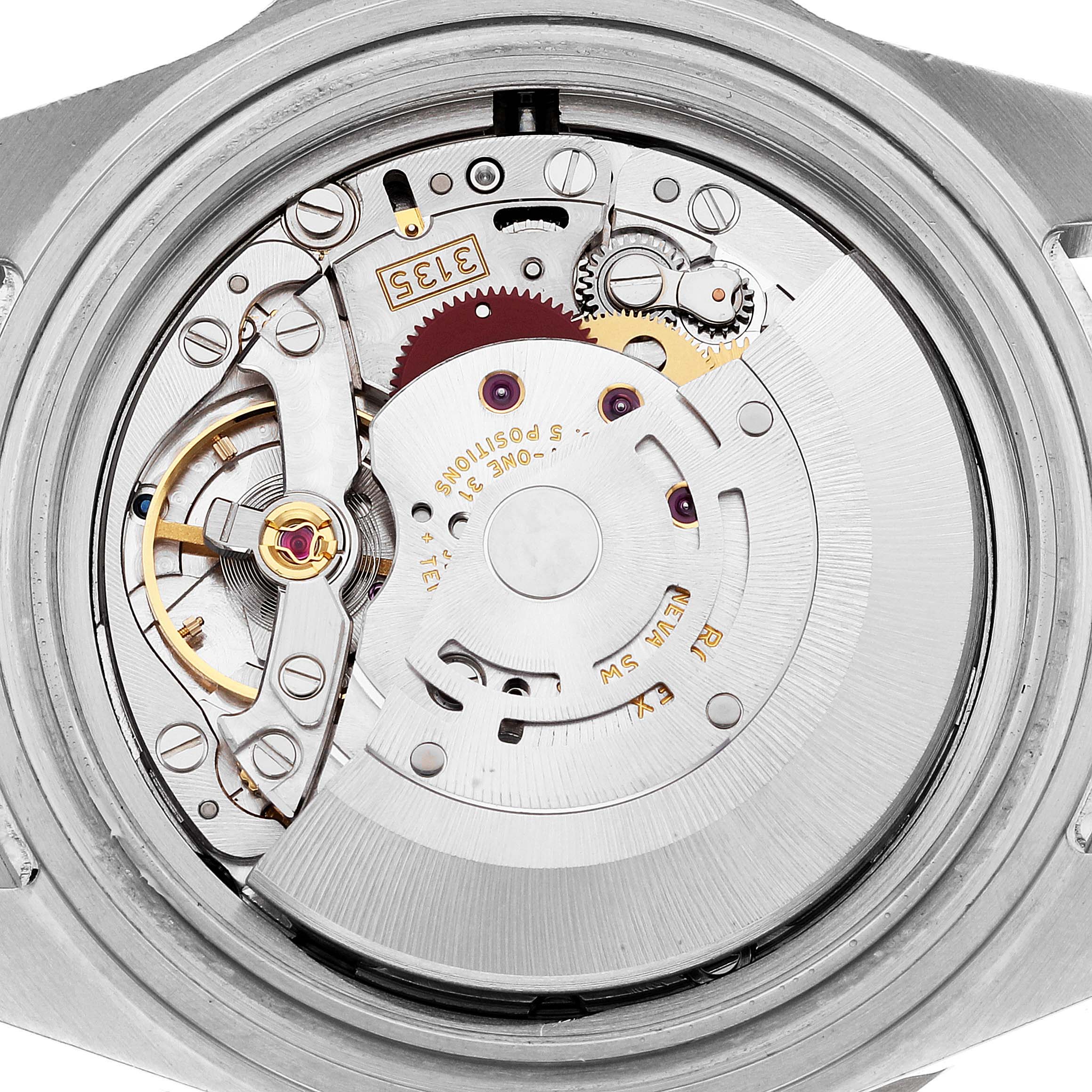 This image shows a close-up view of the internal mechanism of a Rolex Submariner 16610 Men
s Stainless Steel Black Dial 16610 Men
s Stainless Steel Black Dial watch.