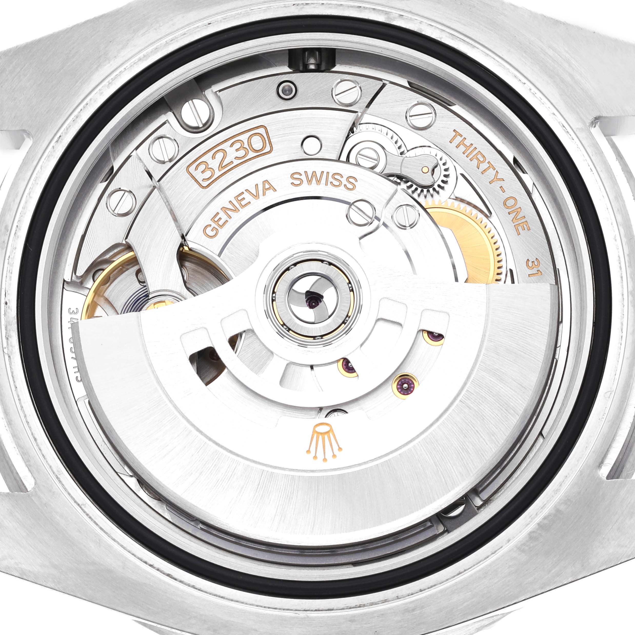The image shows the internal movement mechanism of a Rolex Submariner 124060 Men
s Stainless Steel Black Dial 124060 Men
s Stainless Steel Black Dial watch from a back angle.