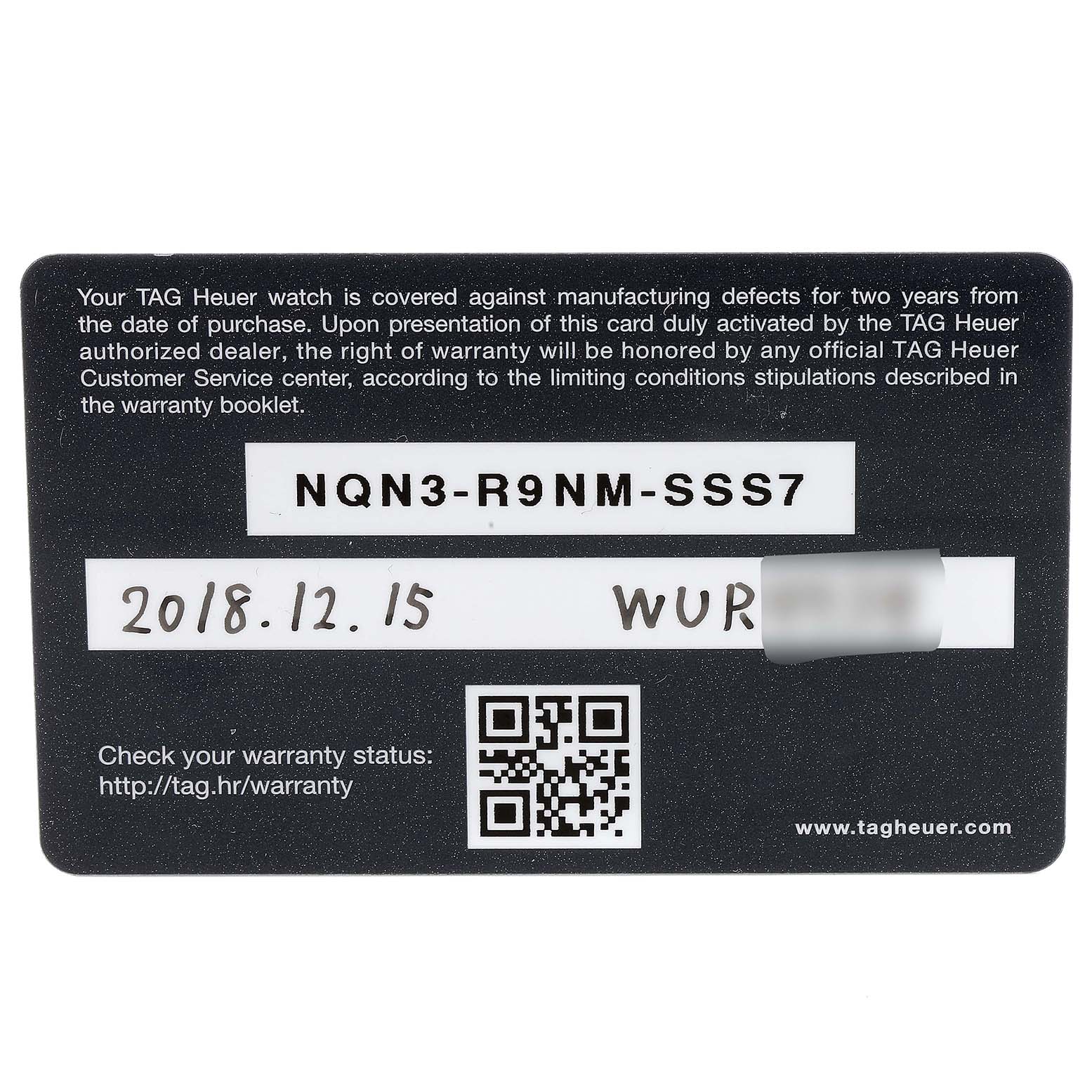 This image shows the warranty card for the Tag Heuer Carrera CAR2A91.BH0742 Men's Titanium Black Dial CAR2A91.BH0742 Men's Titanium Black Dial model watch, displayed from a top-down angle.