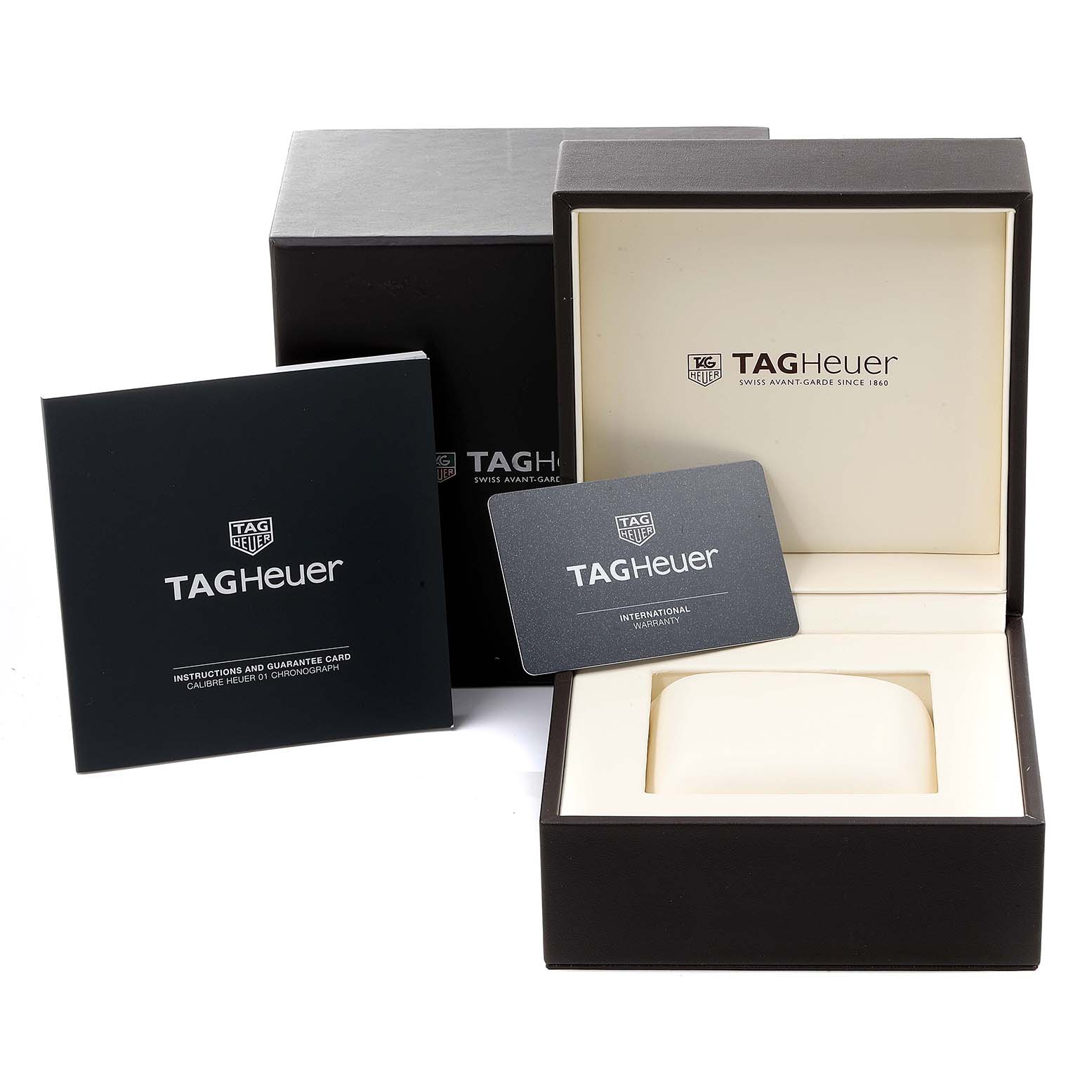 The image shows a Tag Heuer Carrera CAR2A91.BH0742 Men's Titanium Black Dial CAR2A91.BH0742 Men's Titanium Black Dial watch box, warranty card, and instruction manual from a front-facing angle.