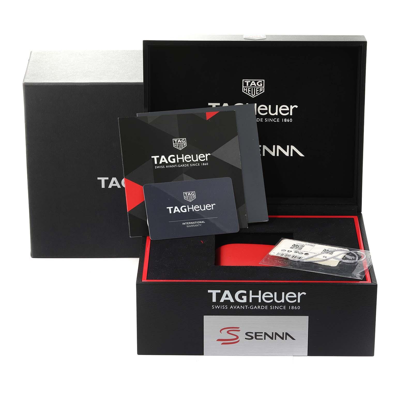 The image shows the open packaging of a Tag Heuer Carrera CBG2013.BA0657 Men's Stainless Steel Black Dial CBG2013.BA0657 Men's Stainless Steel Black Dial watch, including warranty cards and booklets.