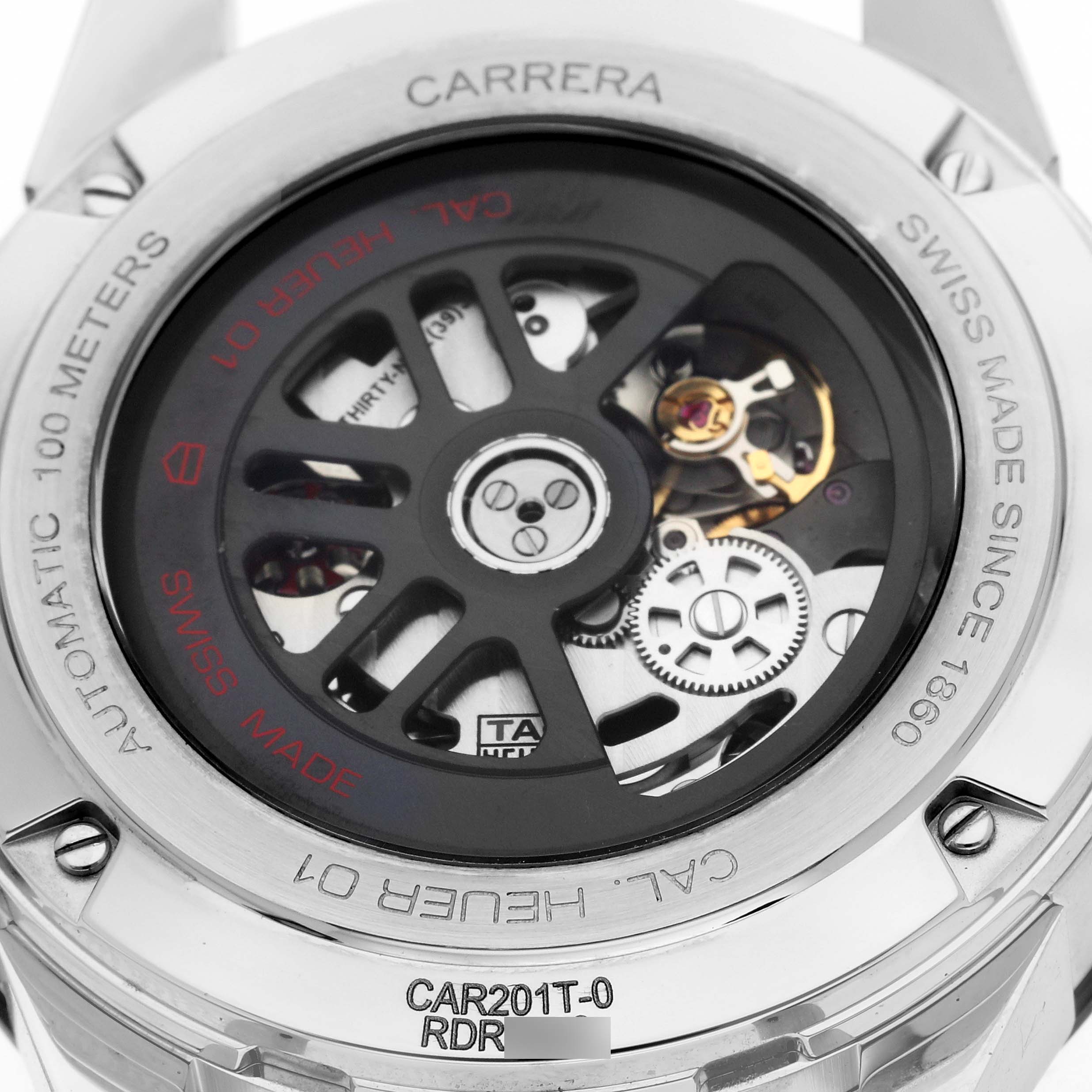 The image shows the back view of the Carrera model by Tag Heuer, highlighting the movement and internal components.