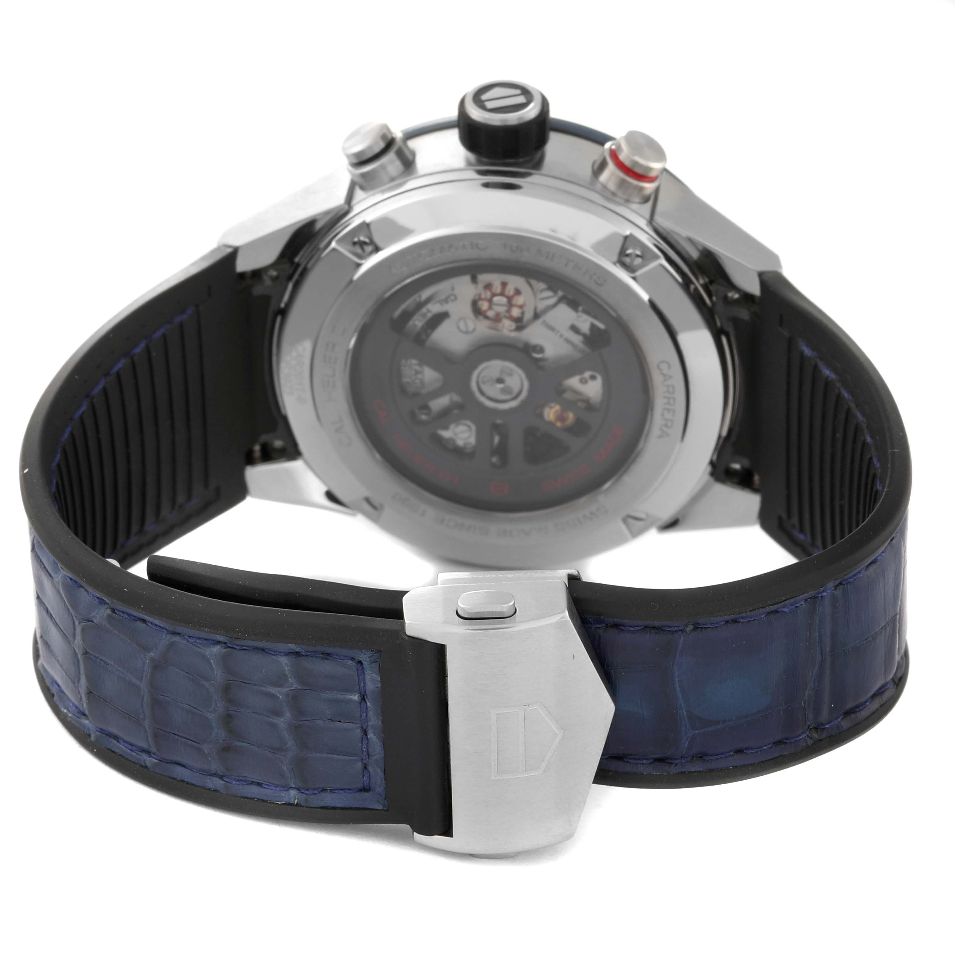 The image shows the back view of a Tag Heuer Carrera CAR201T Men's Stainless Steel Blue Dial CAR201T Men's Stainless Steel Blue Dial watch, highlighting its strap, clasp, and movement through the transparent case back.