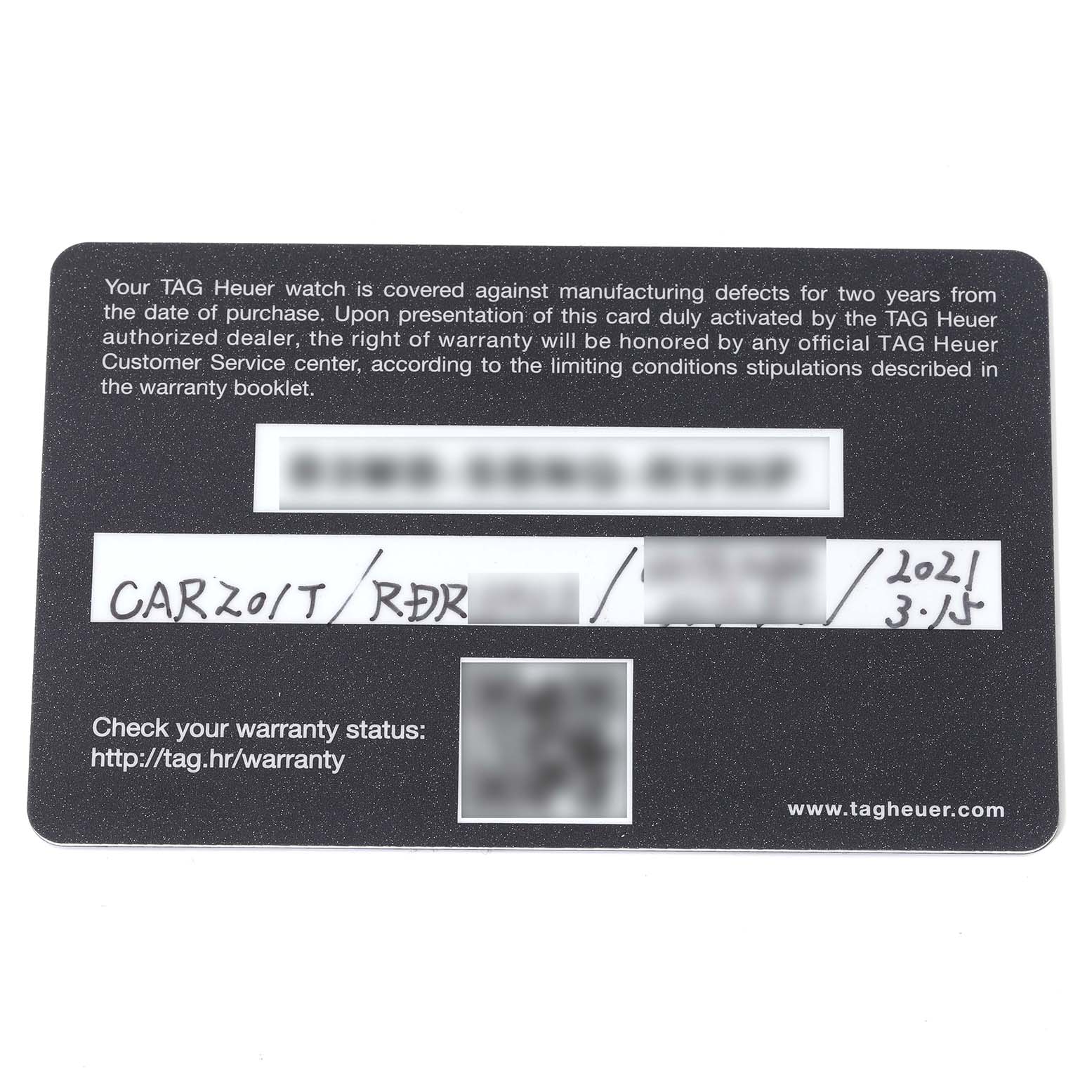 This image shows the warranty card for the Tag Heuer Carrera CAR201T Men's Stainless Steel Blue Dial CAR201T Men's Stainless Steel Blue Dial model watch.