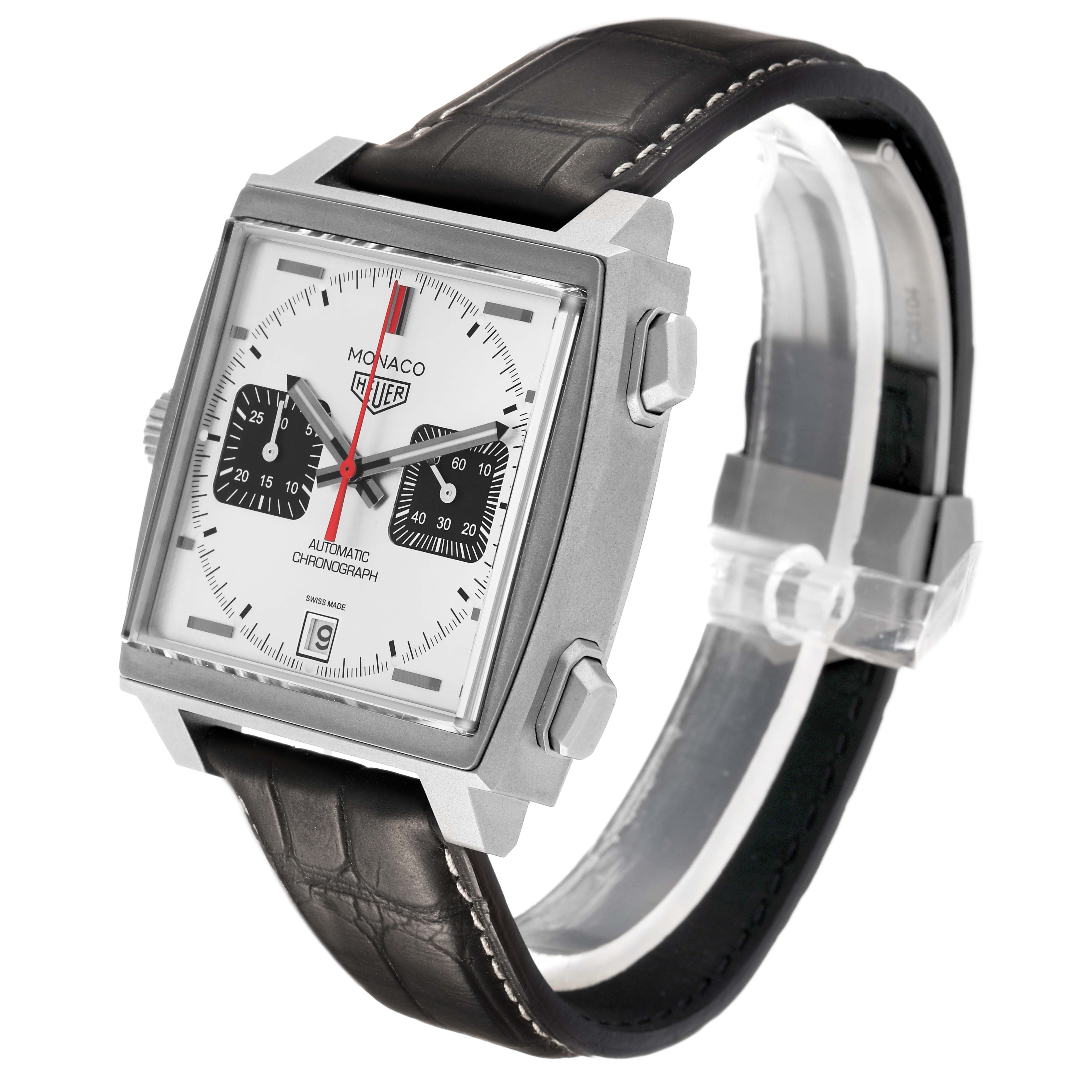 The Tag Heuer Monaco CAW218B.FC6496 Men's Titanium Silver Dial watch is shown at an angle displaying the square face, crown, pushers, and leather strap.