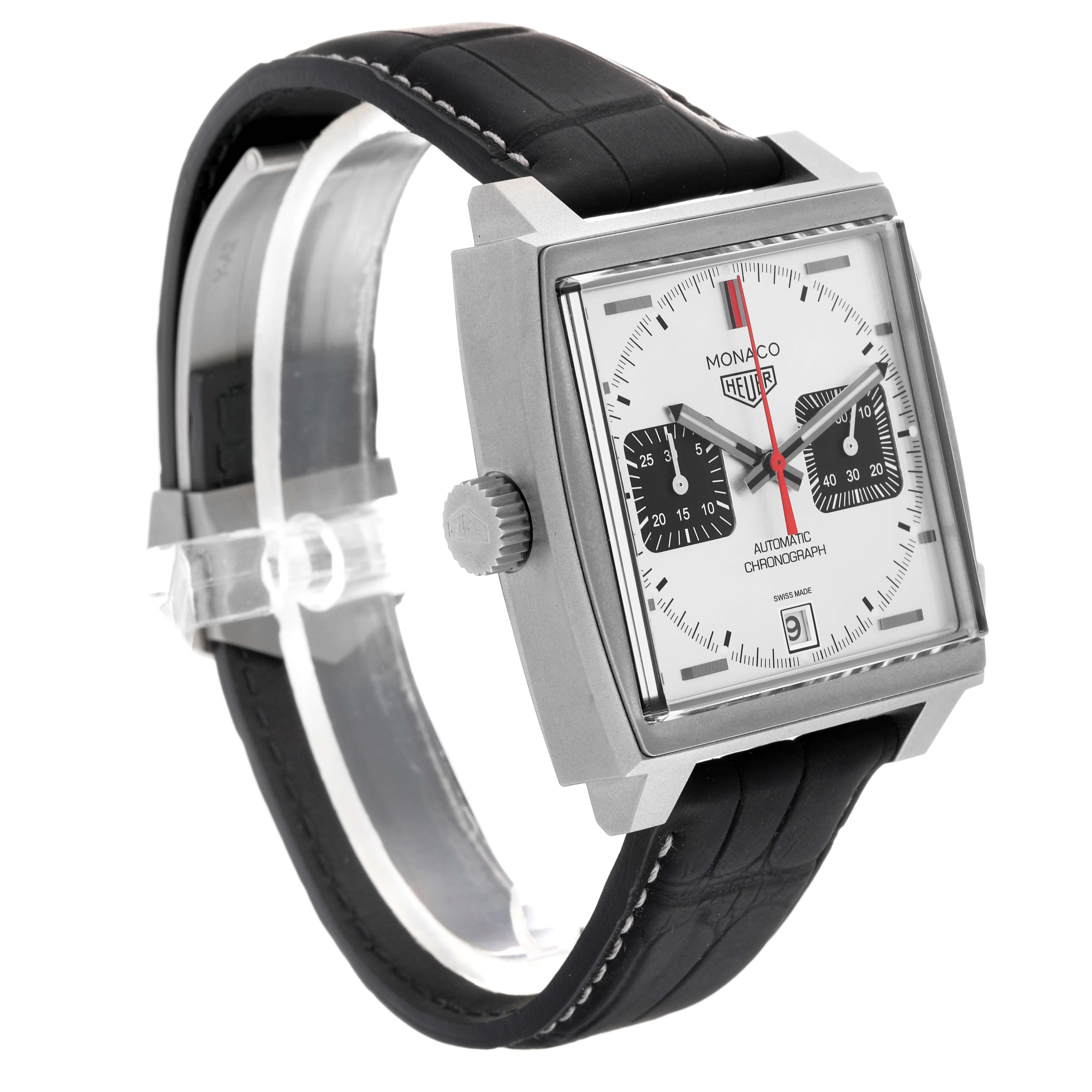 The Tag Heuer Monaco CAW218B.FC6496 Men
s Titanium Silver Dial CAW218B.FC6496 Men
s Titanium Silver Dial watch is shown at a three-quarter angle, highlighting its square face, crown, and black leather strap.