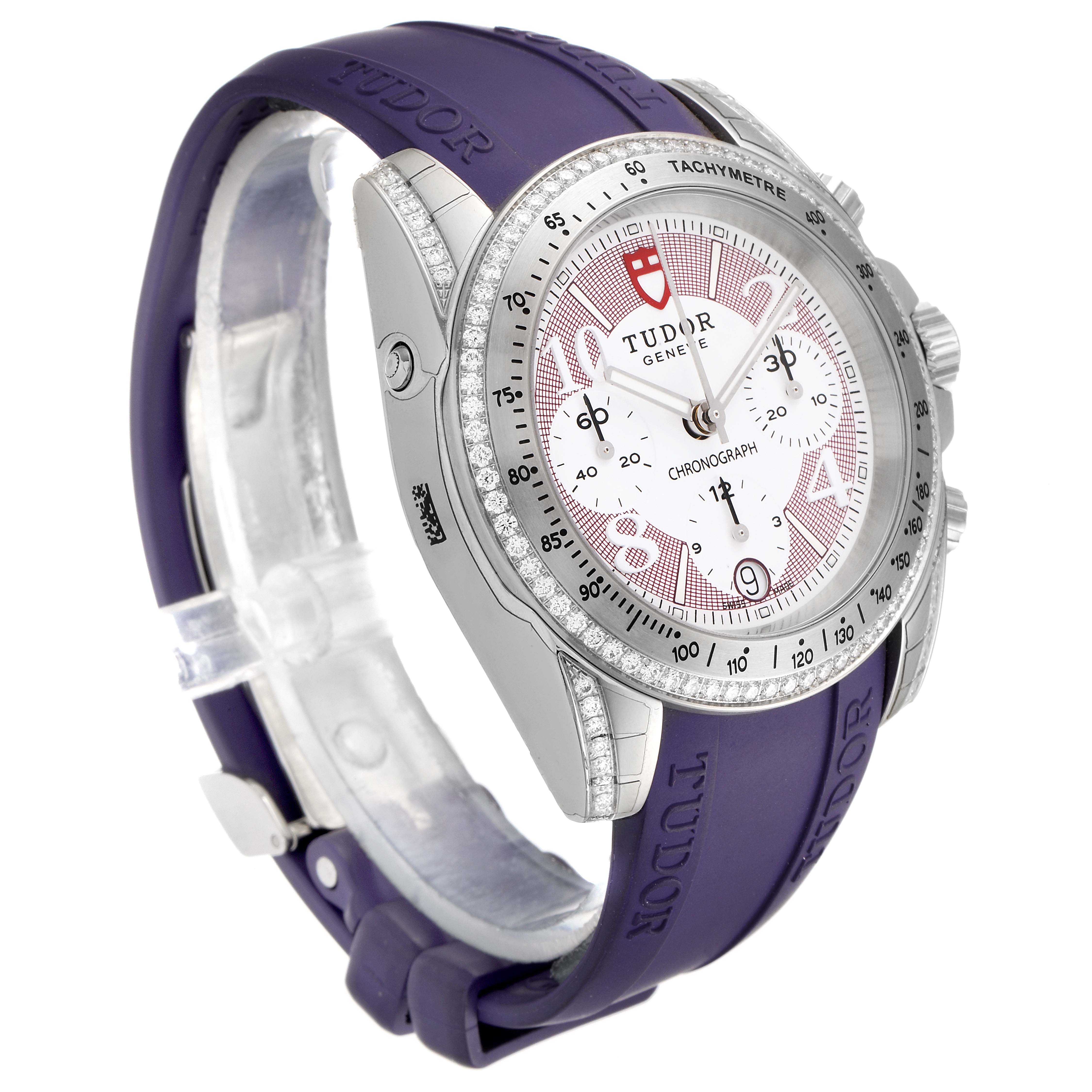 This image shows a Tudor Grantour 20310 Men's Stainless Steel White Dial 20310 Men's Stainless Steel White Dial watch at a slightly angled side view, revealing the face, crown, and purple strap.