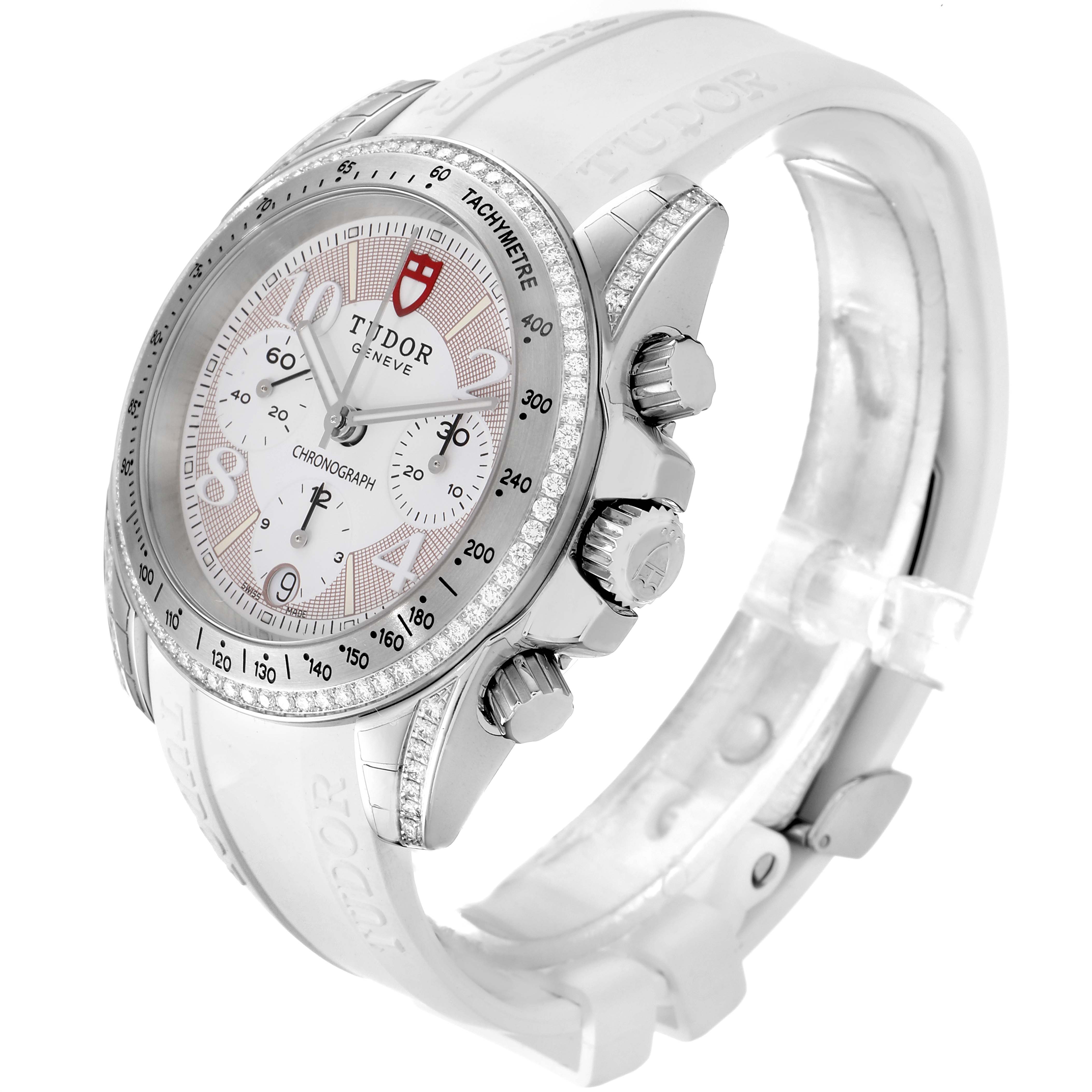 The Tudor Grantour 20310 Men's Stainless Steel White Dial 20310 Men's Stainless Steel White Dial watch is shown at an angled side view, highlighting the dial, bezel, and pushers/crowns.