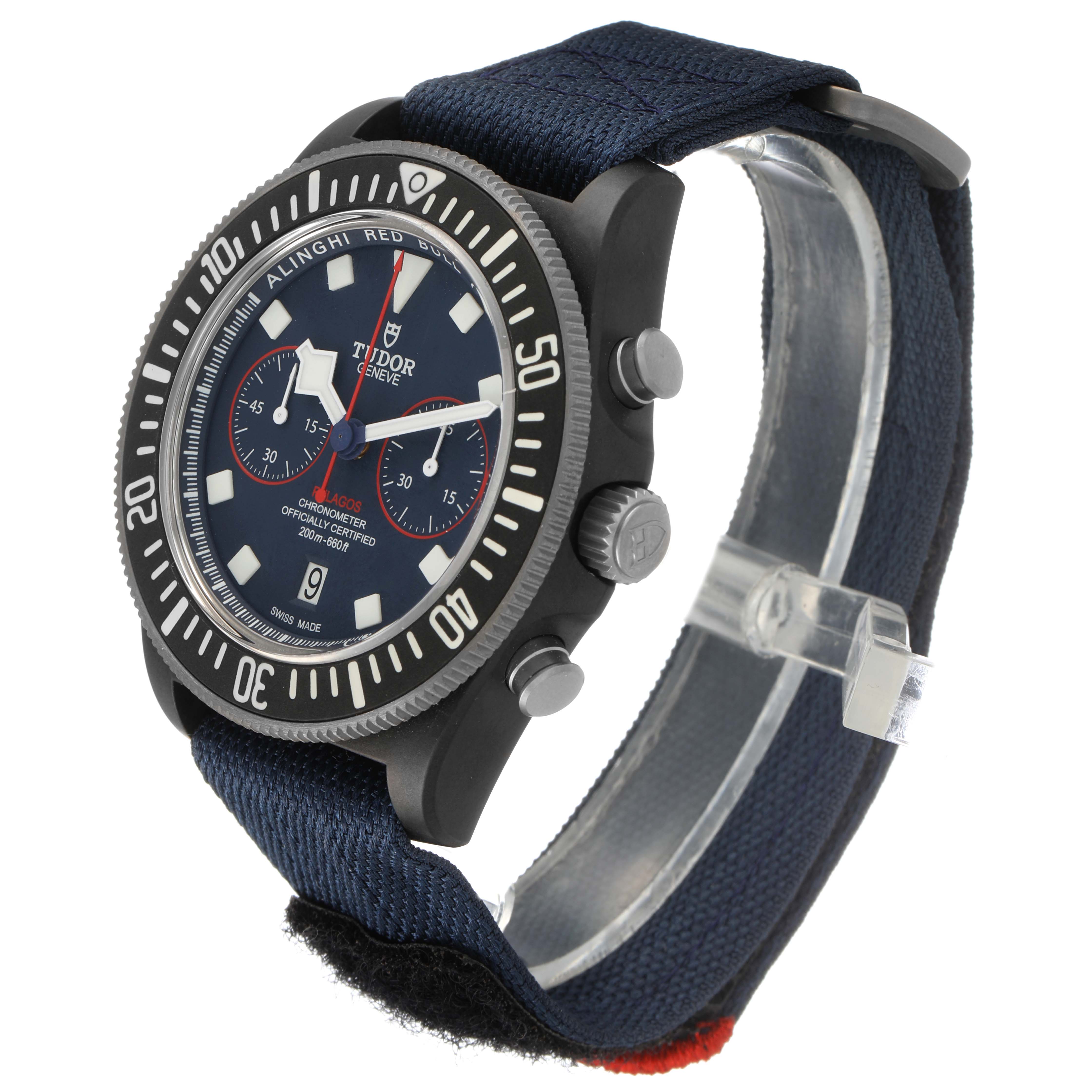 The Tudor Pelagos M25807KN Men's Ceramic Blue Dial watch is shown at an oblique angle, highlighting the face, bezel, side buttons, and fabric strap.