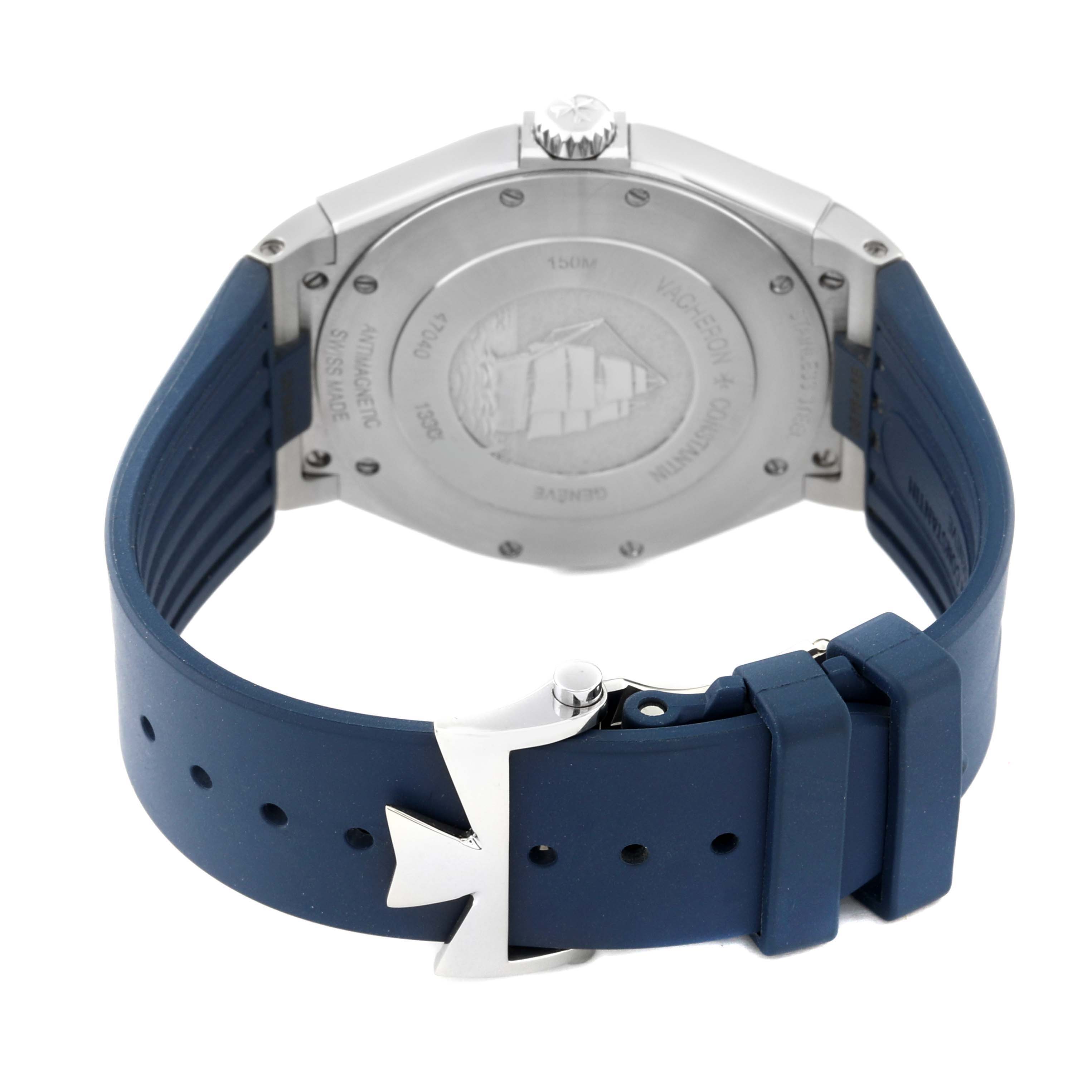 The image shows the back of a Vacheron Constantin Overseas 47040/000A Men's Stainless Steel Blue Dial 47040/000A Men's Stainless Steel Blue Dial watch with its blue strap and clasp.