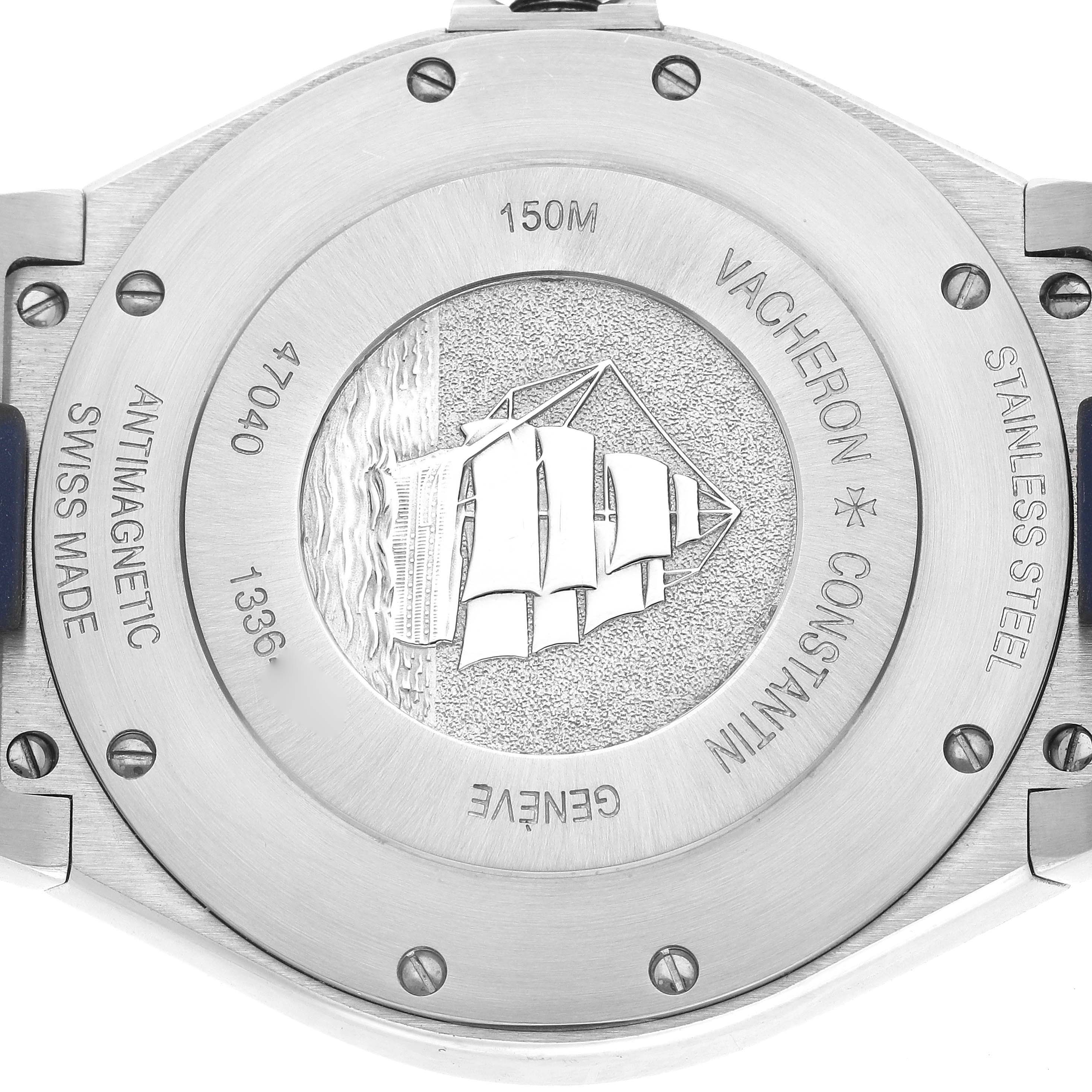 The image shows the back case of the Vacheron Constantin Overseas 47040/000A Men's Stainless Steel Blue Dial 47040/000A Men's Stainless Steel Blue Dial watch, highlighting its engravings and maritime emblem.