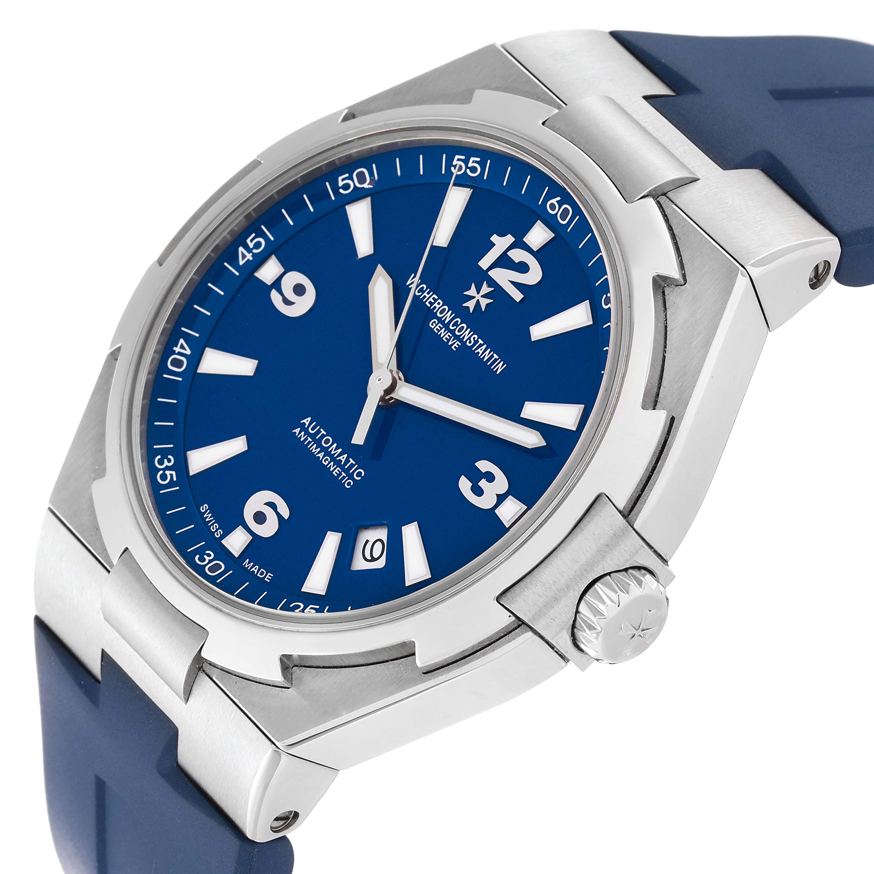 The image shows a Vacheron Constantin Overseas 47040/000A Men's Stainless Steel Blue Dial 47040/000A Men's Stainless Steel Blue Dial watch at a slight angle, highlighting the blue dial, crown, and part of the stainless-steel case with a blue strap.
