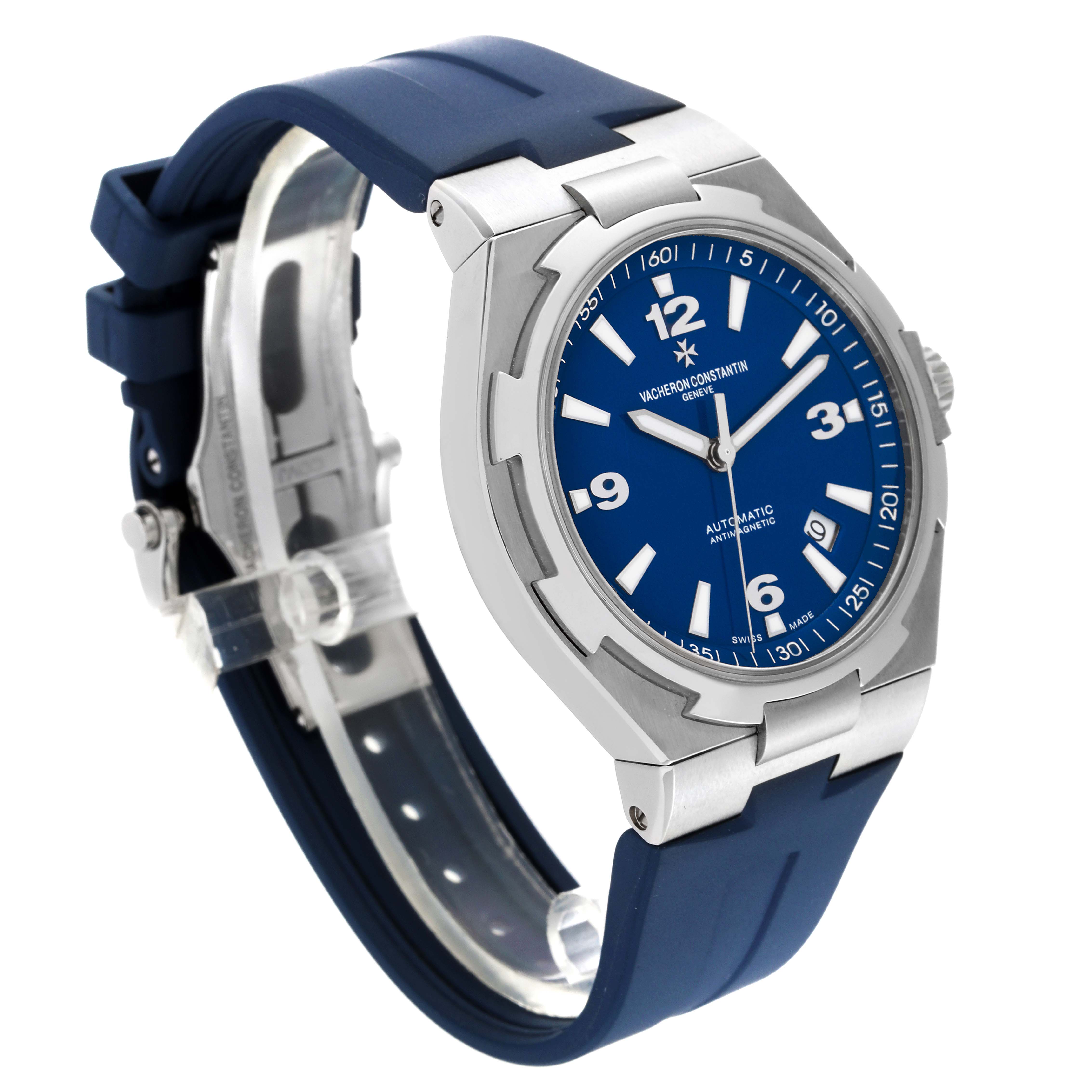 The Vacheron Constantin Overseas 47040/000A Men's Stainless Steel Blue Dial 47040/000A Men's Stainless Steel Blue Dial watch is at a three-quarter angle, showing the blue dial, bezel, case, and rubber strap.