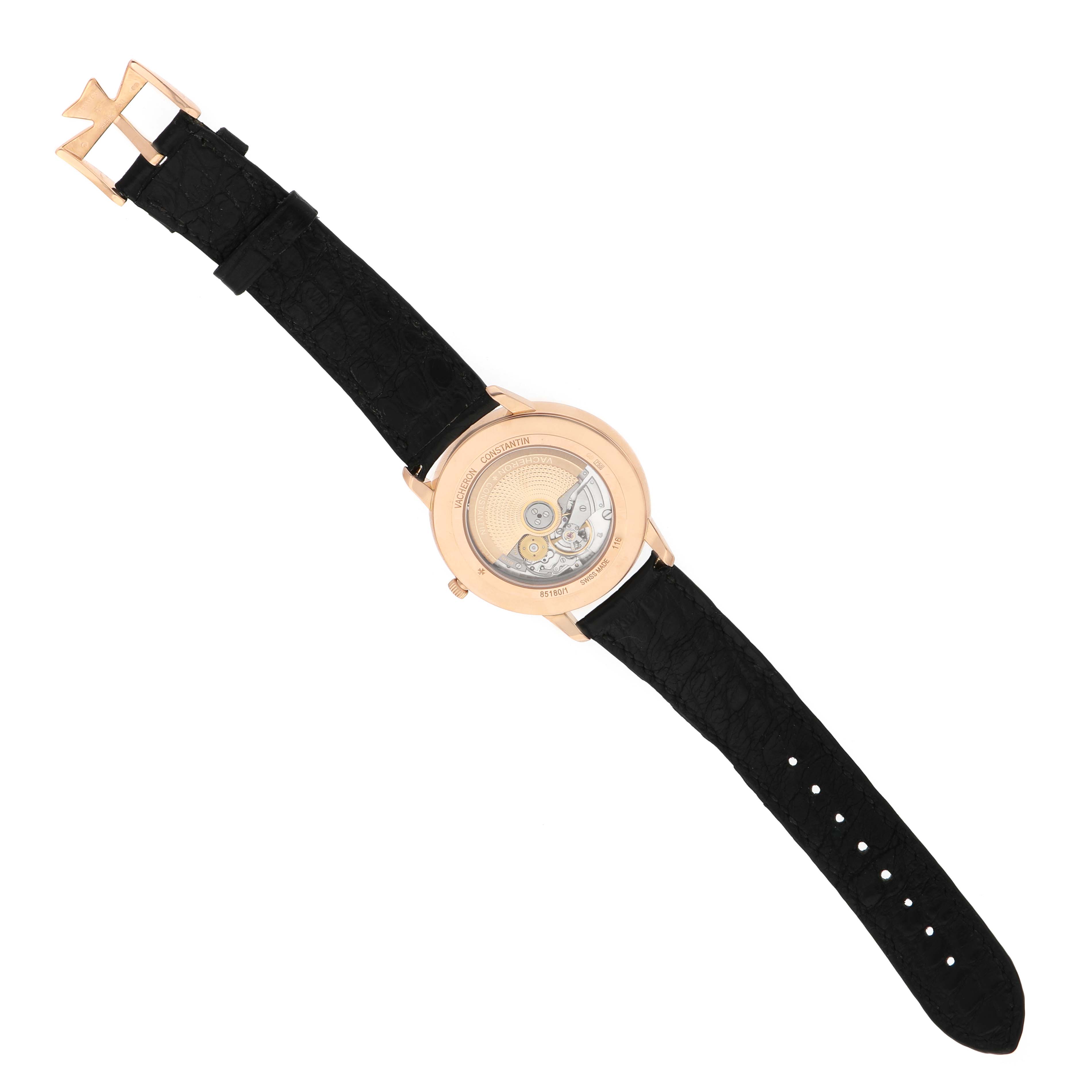 The image shows the back of the Vacheron Constantin Patrimony 85180/000R-9232 Men's Rose Gold Black Dial watch, highlighting its movement and black strap.
