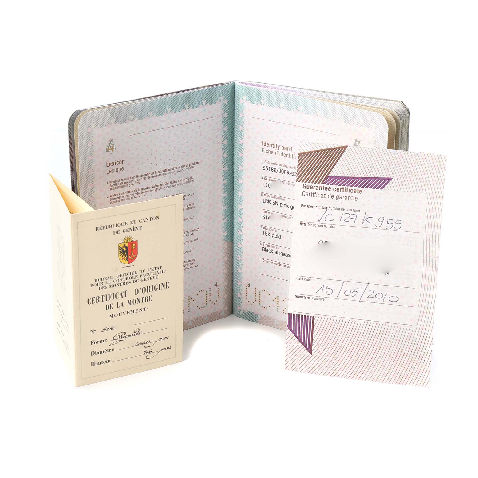 The image shows a warranty book and certificate for a Vacheron Constantin Patrimony 85180/000R-9232 Men's Rose Gold Black Dial watch, displayed upright and slightly open.
