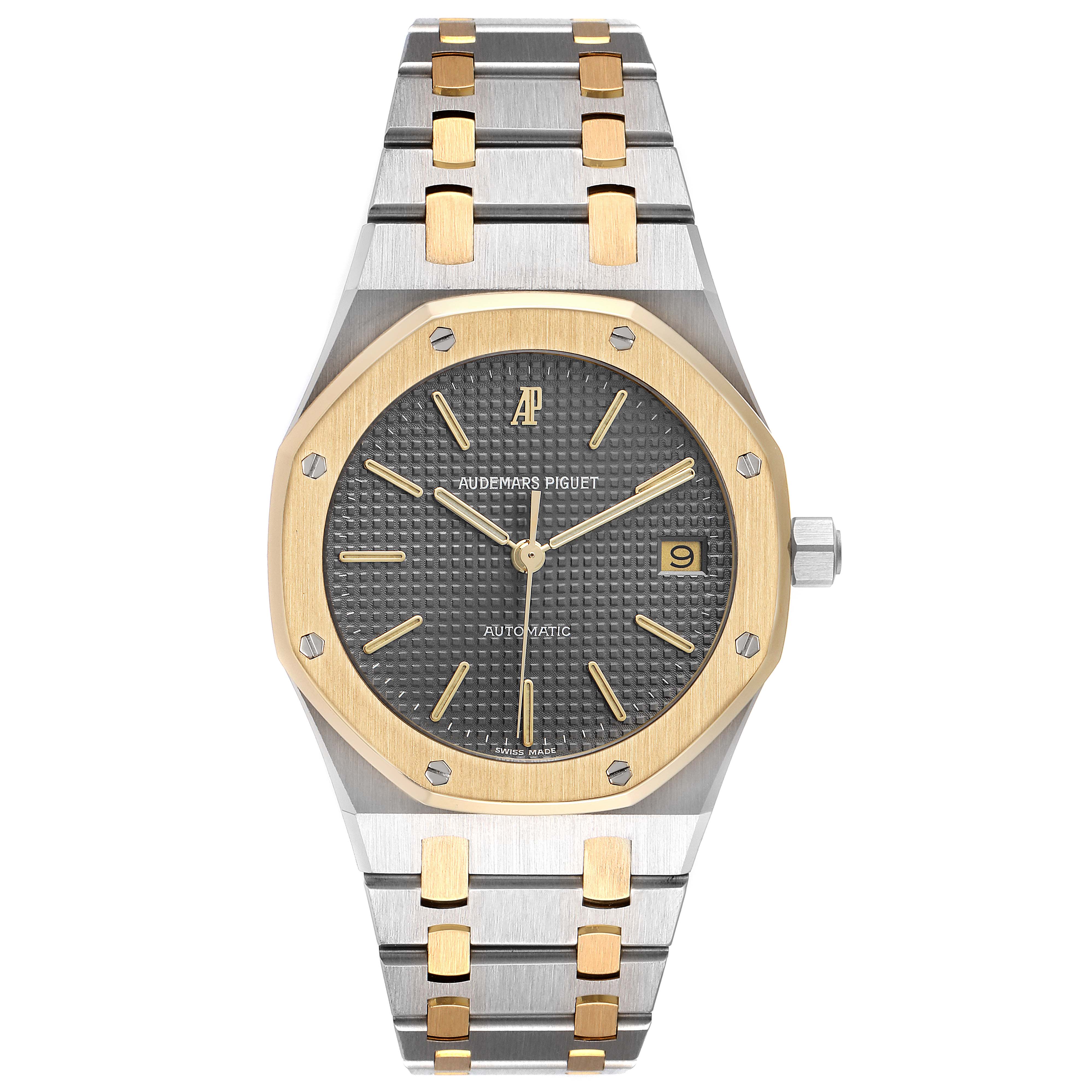 The image shows a front view of an Audemars Piguet Royal Oak 14700SA.00.0789SA.01.B Men's Steel and Gold (two tone) Grey Dial 14700SA.00.0789SA.01.B Men's Steel and Gold (two tone) Grey Dial watch, highlighting the dial, bezel, and bracelet.