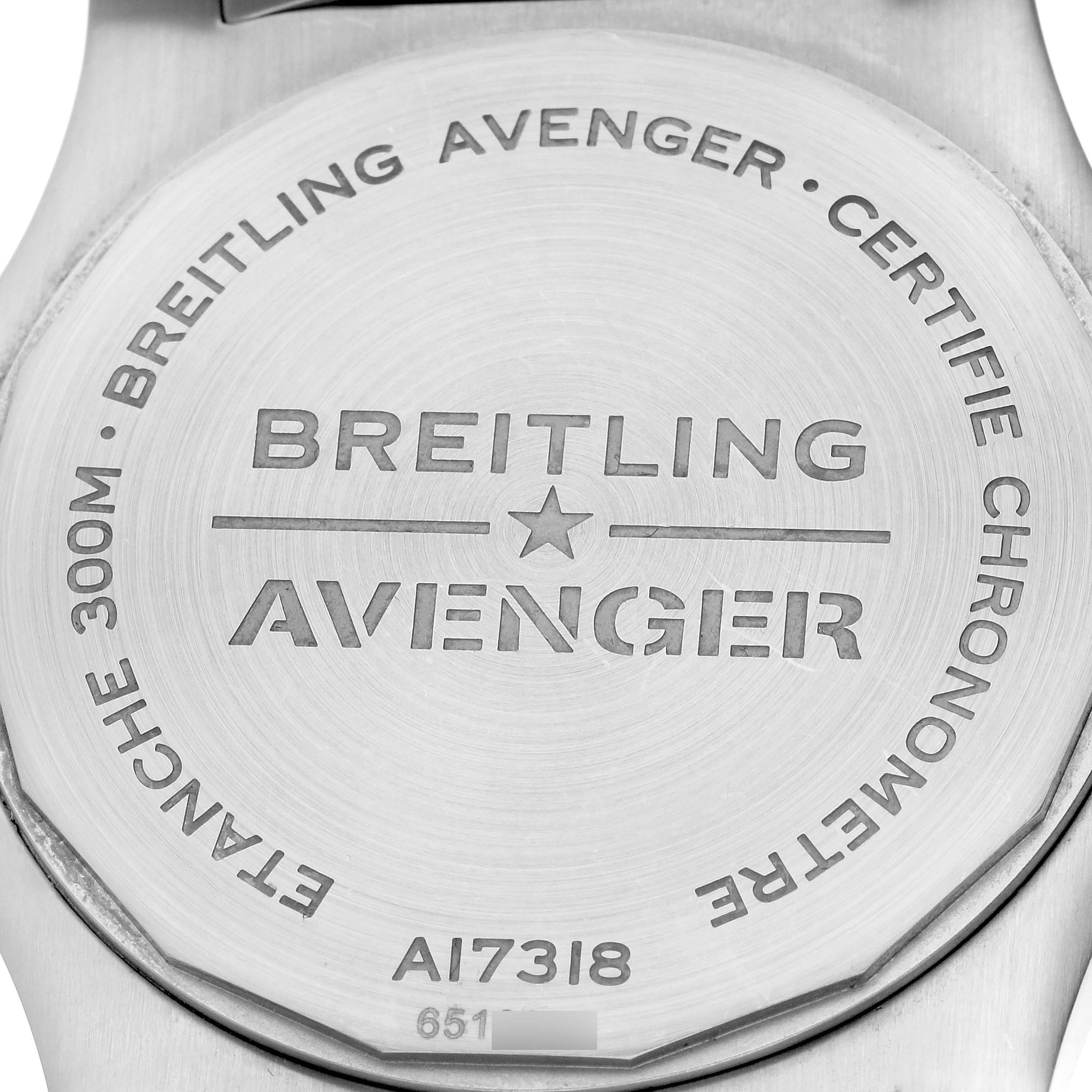 The image shows the back case of a Breitling Avenger A17318 Men's Stainless Steel Black Dial A17318 Men's Stainless Steel Black Dial watch with engraved details.