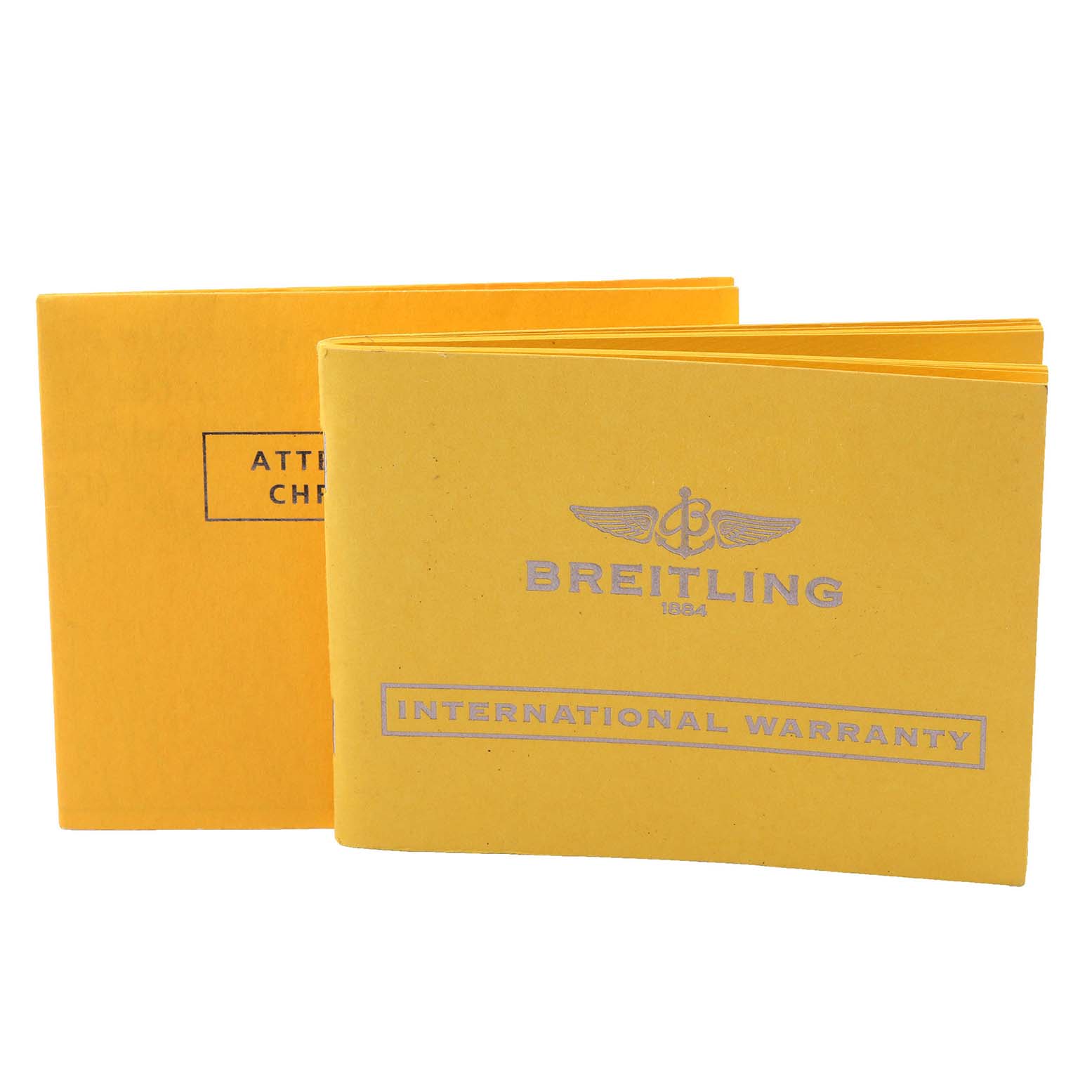 The image shows two booklets, one labeled "INTERNATIONAL WARRANTY" for the Breitling Chronomat AB011012 Men's Stainless Steel Mother of Pearl Dial AB011012 Men's Stainless Steel Mother of Pearl Dial watch.