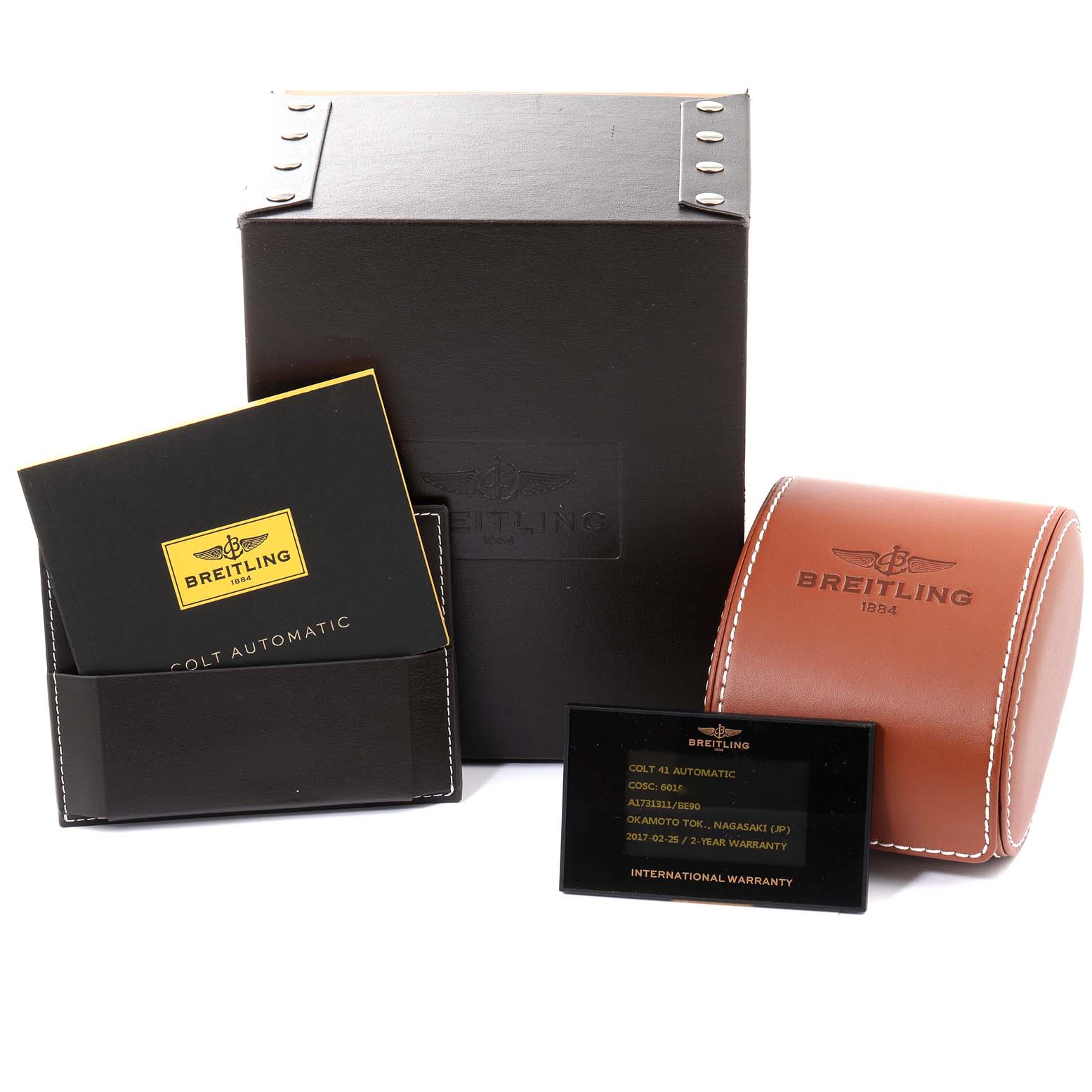 This image shows the Breitling Colt A17313 Men's Stainless Steel Black Dial A17313 Men's Stainless Steel Black Dial watch's box, user manual, warranty card, and brown leather case from a front angle.