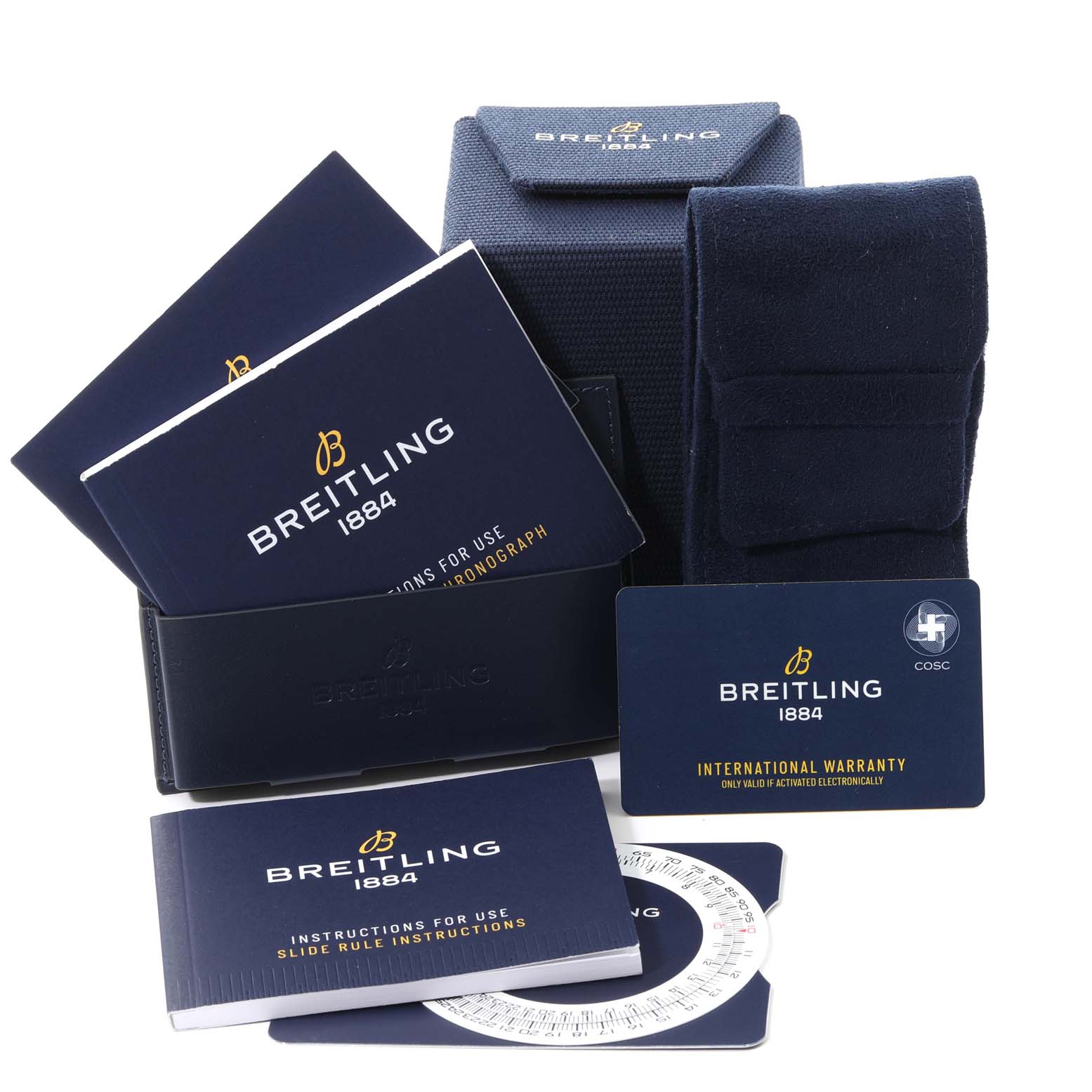 The image shows the packaging and accessories for a Breitling Navitimer AB0121211B1A1 Men
s Stainless Steel Black Dial AB0121211B1A1 Men
s Stainless Steel Black Dial, including manuals, a warranty card, and a case.