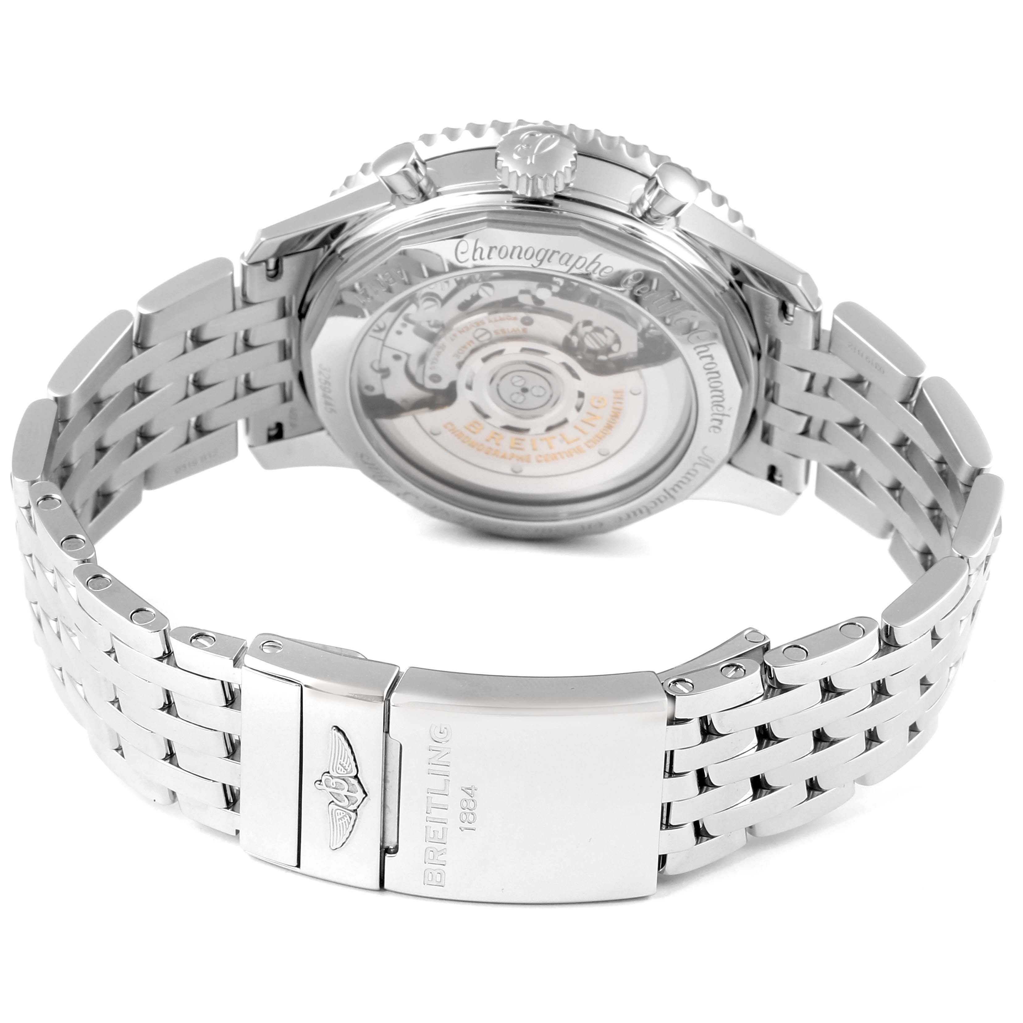 The image shows the back view of the Breitling Navitimer AB0121 Men
s Stainless Steel Black Dial AB0121 Men
s Stainless Steel Black Dial watch, focusing on the open case back and stainless steel bracelet.