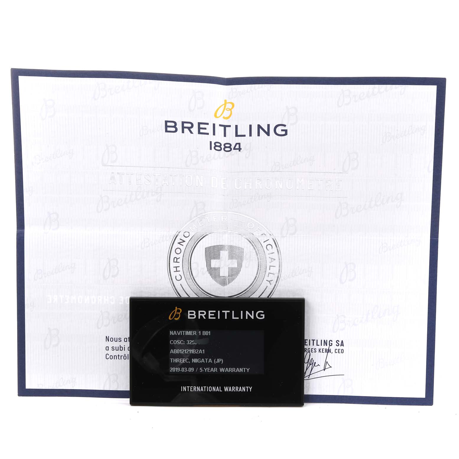 The image shows warranty paperwork and a certification card for a Breitling Navitimer AB0121 Men
s Stainless Steel Black Dial AB0121 Men
s Stainless Steel Black Dial watch, model Navitimer 1 B01.