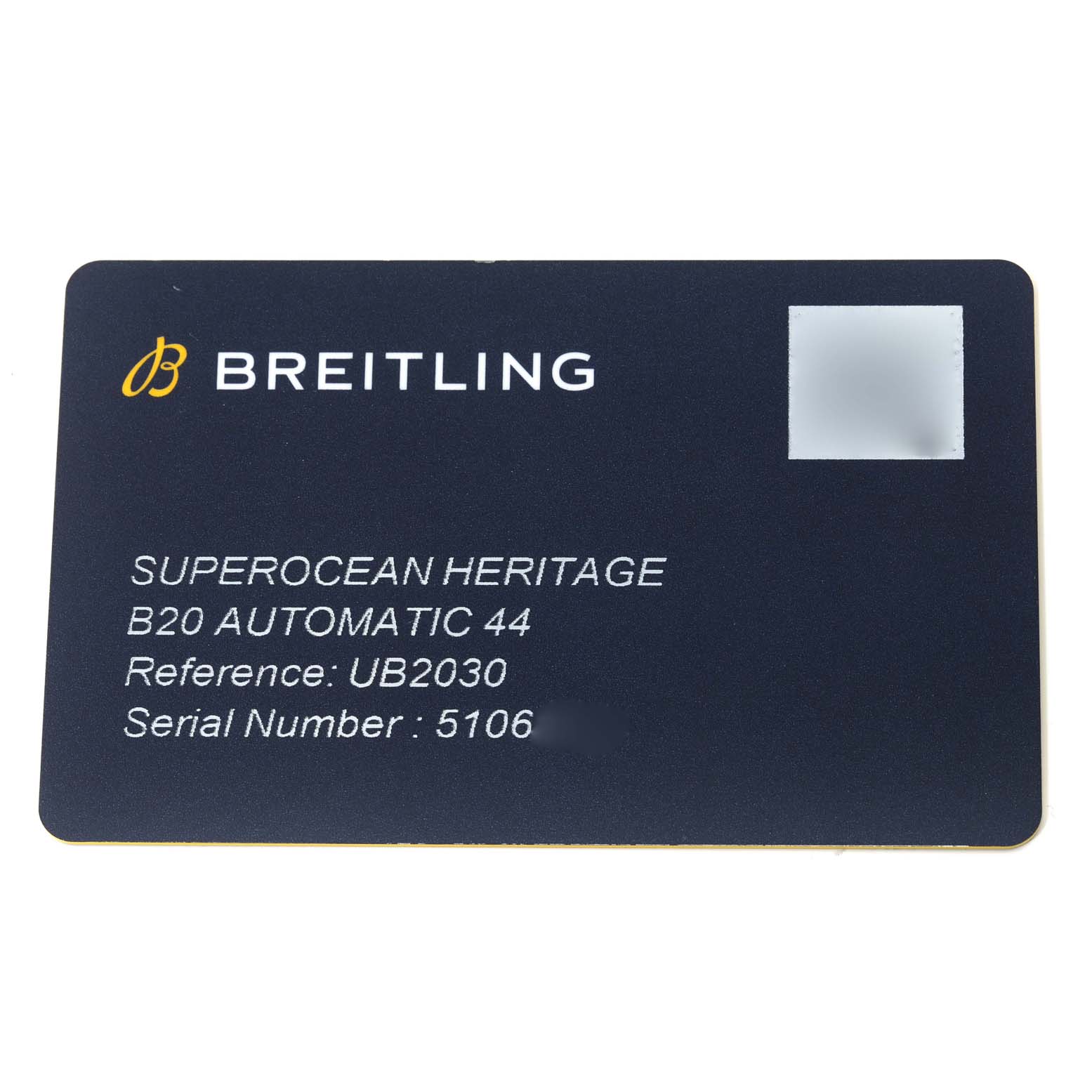 The image shows a warranty card for the Breitling Superocean UB2030121B1S1 Men's Steel and Gold (two tone) Black Dial UB2030121B1S1 Men's Steel and Gold (two tone) Black Dial Heritage model B20 Automatic 44, reference UB2030.