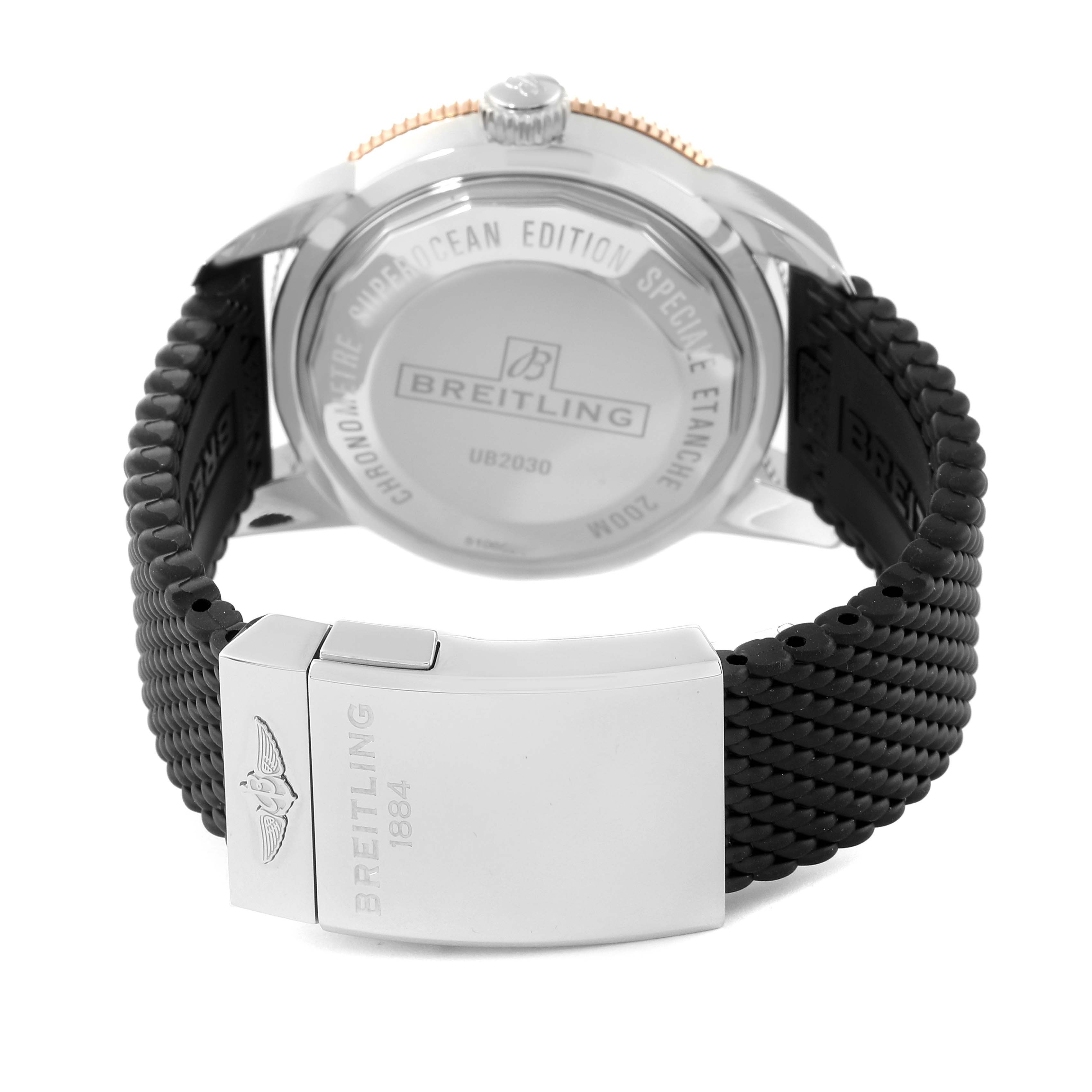 The image shows the back case and strap of the Breitling Superocean UB2030121B1S1 Men's Steel and Gold (two tone) Black Dial UB2030121B1S1 Men's Steel and Gold (two tone) Black Dial watch with the brand's logo and clasp.