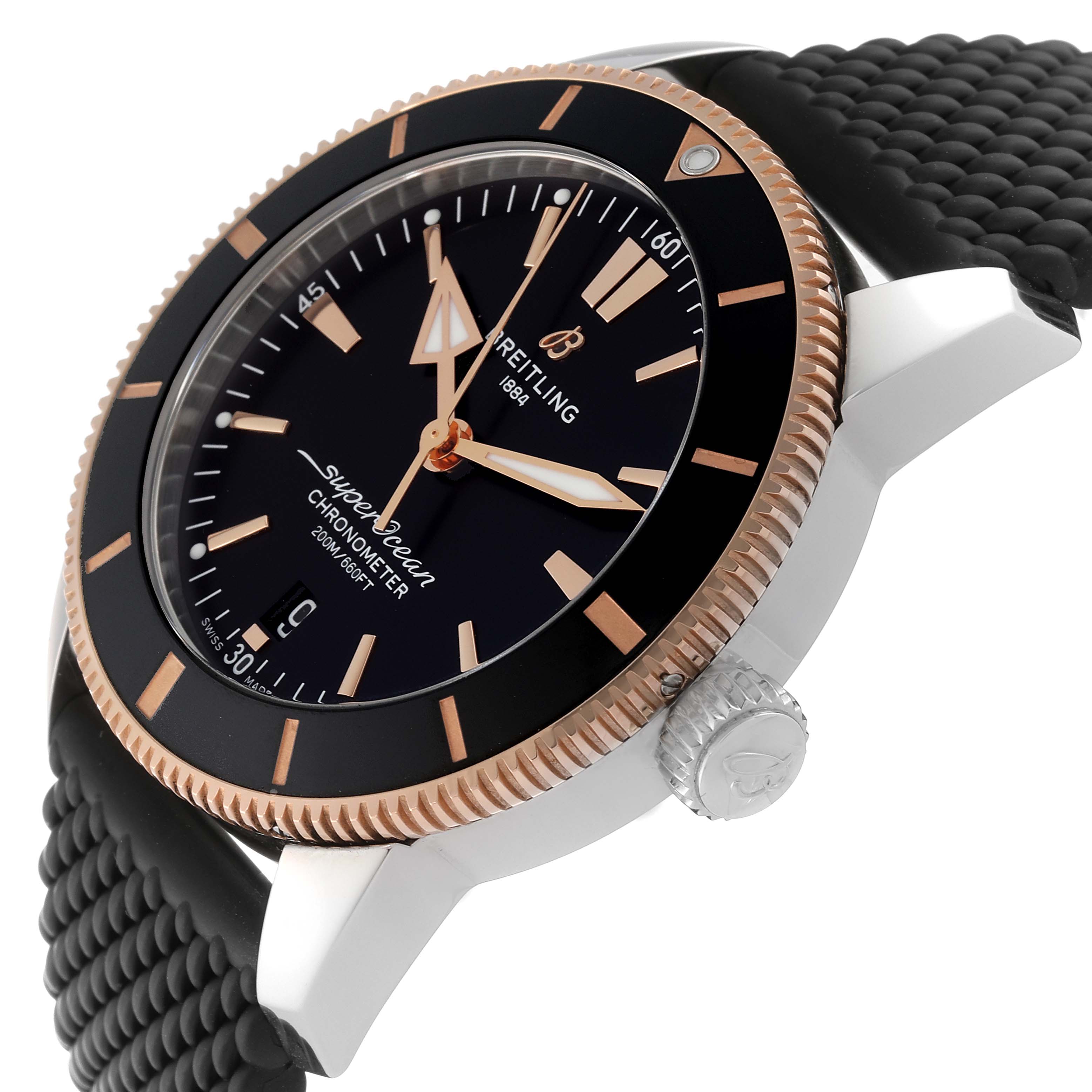 This image shows a close-up, angled view of the Breitling Superocean UB2030121B1S1 Men's Steel and Gold (two tone) Black Dial UB2030121B1S1 Men's Steel and Gold (two tone) Black Dial Chronometer, highlighting the bezel, crown, and part of the strap.