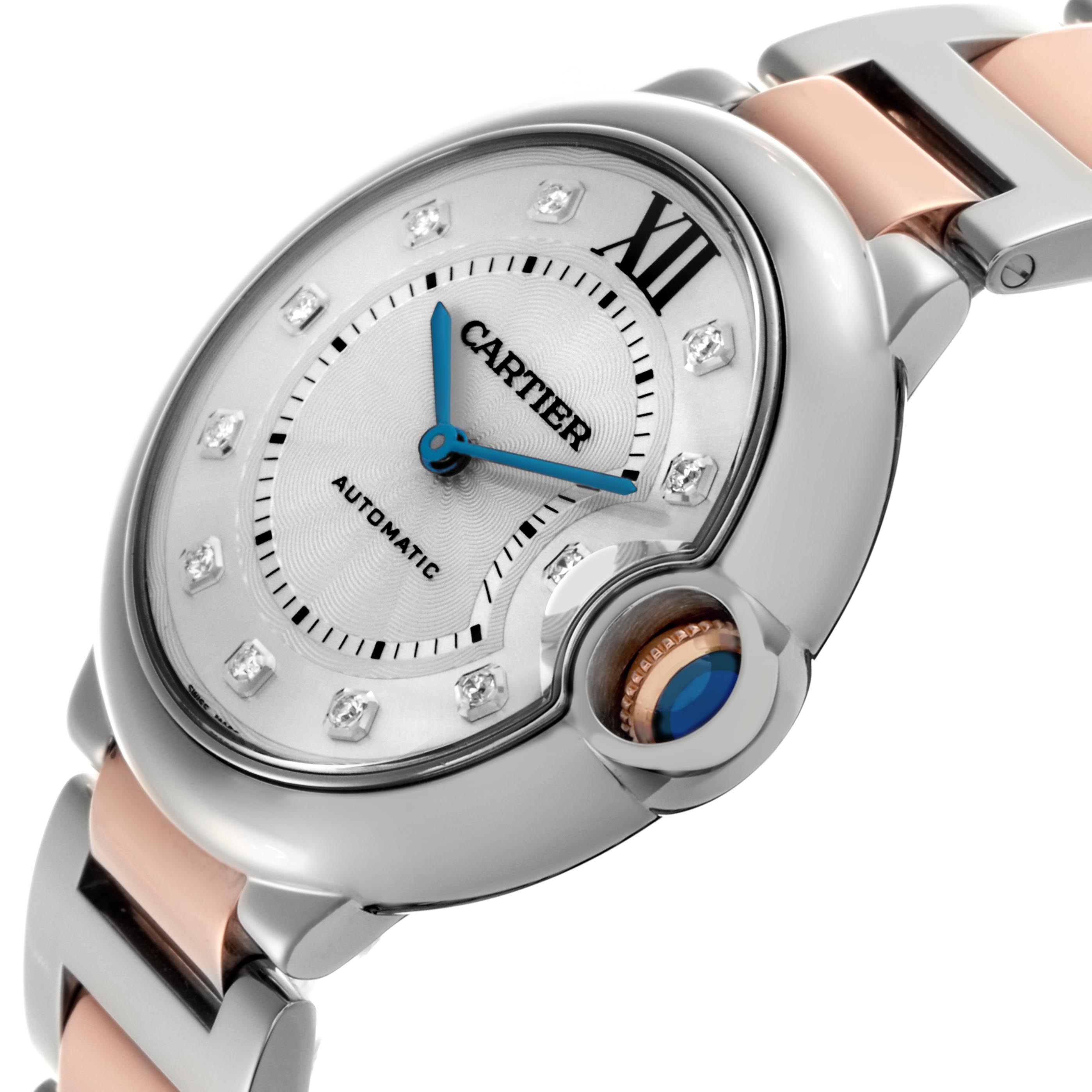 The Cartier Ballon Bleu W3BB0018 Women
s Steel and Gold (two tone) White Dial W3BB0018 Women
s Steel and Gold (two tone) White Dial watch is shown at an angle highlighting the dial, crown with blue cabochon, and part of the bracelet.