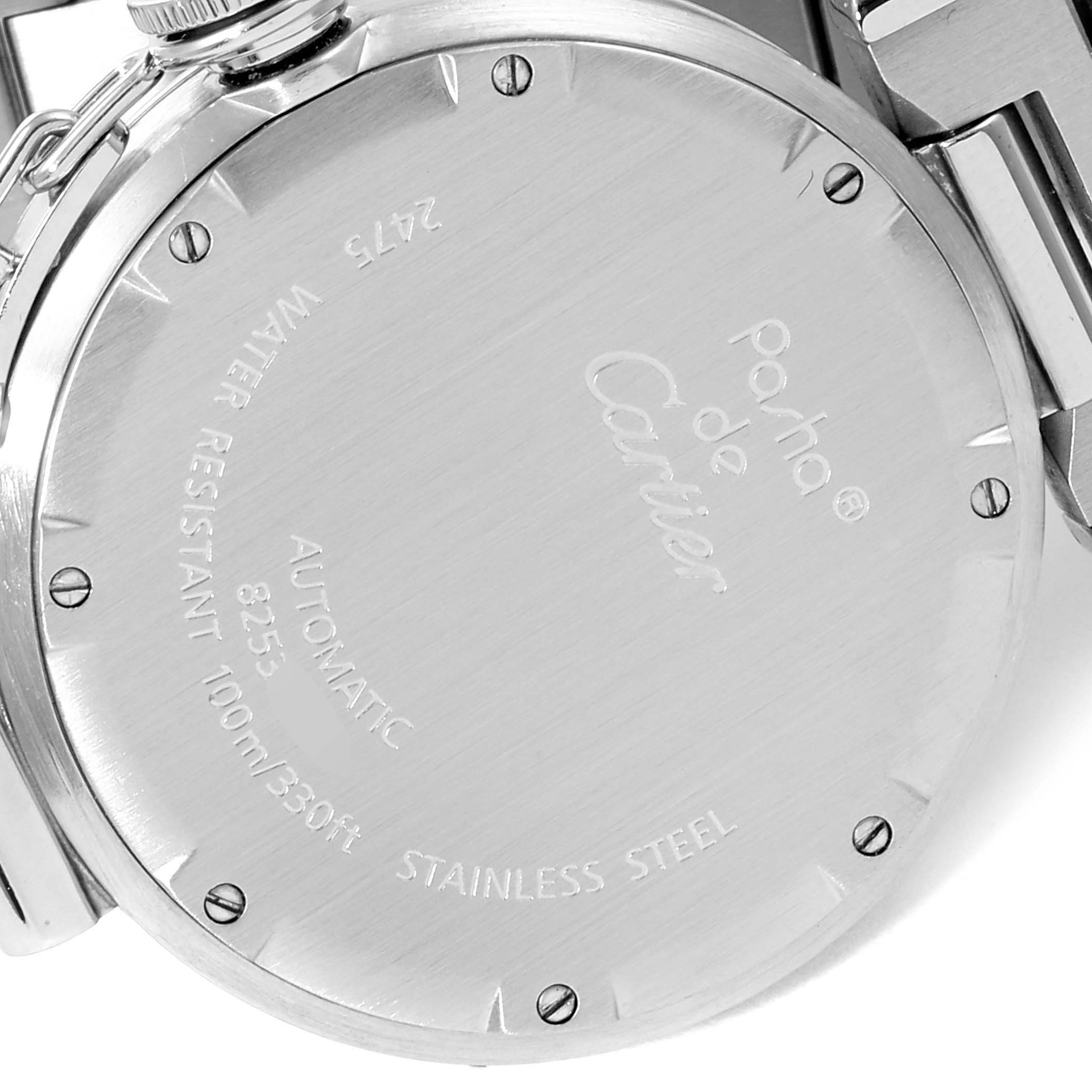 This image shows the back case of the Cartier Pasha W31058M7 Women's Stainless Steel Pink Dial W31058M7 Women's Stainless Steel Pink Dial watch with engravings and screws visible.