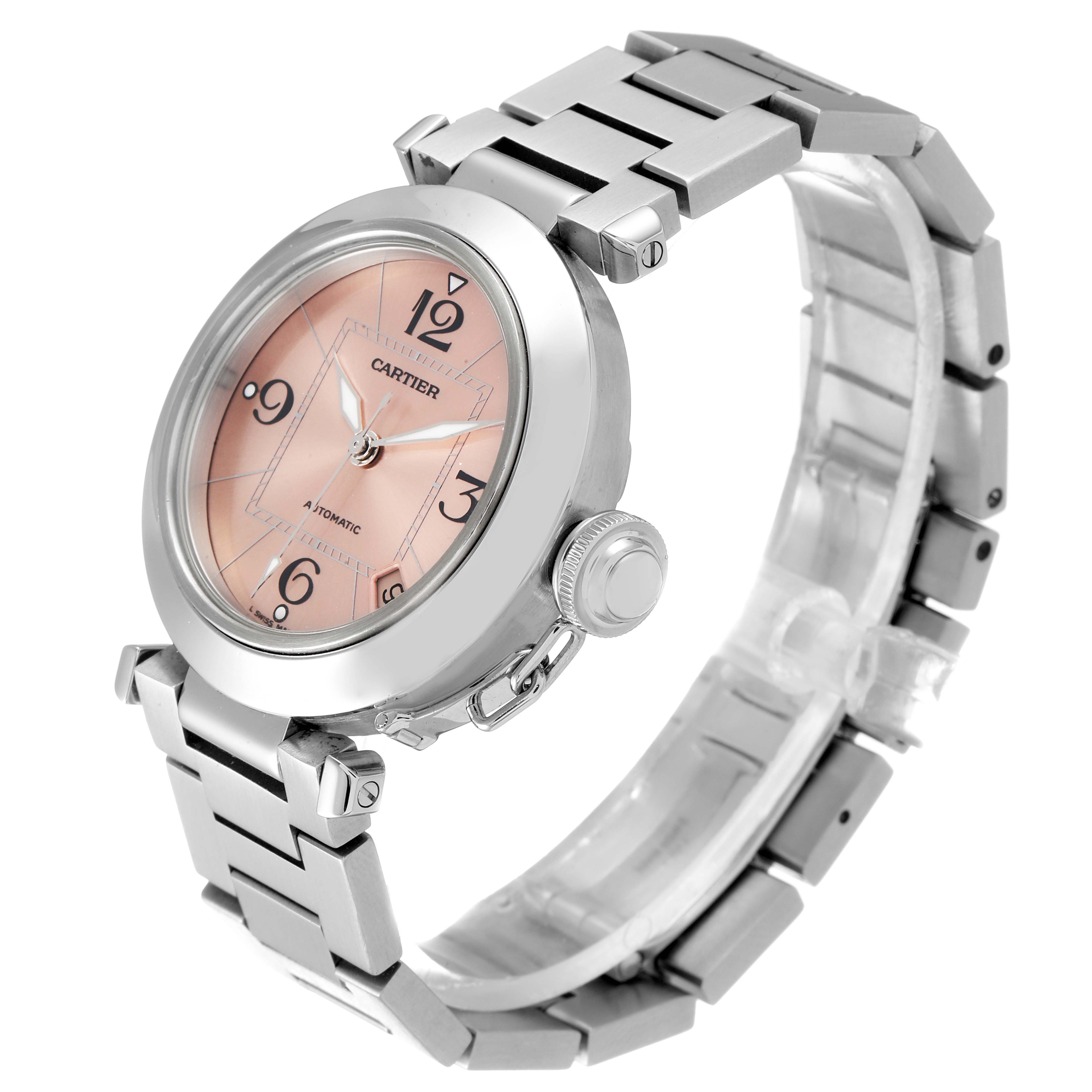 The image shows a Cartier Pasha W31075M7 Women's Stainless Steel Pink Dial W31075M7 Women's Stainless Steel Pink Dial watch at an angled side view, displaying the round dial, crown, and metal bracelet.